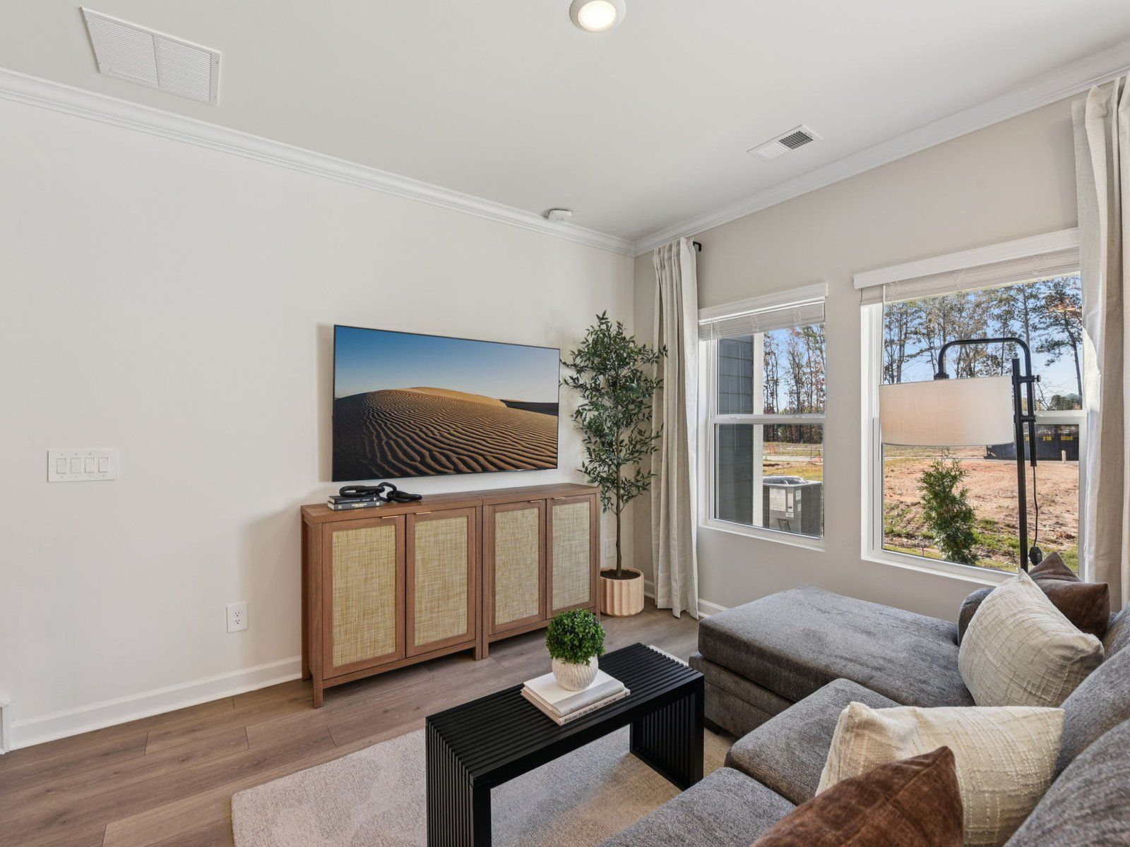 The great room offers an abundance of natural light.