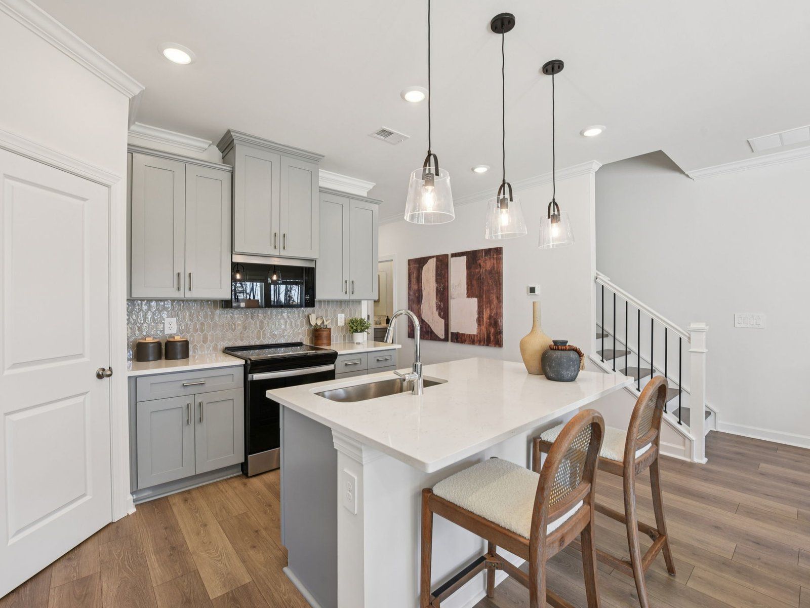 Cook your favorite meals in the sleek, modern kitchen.