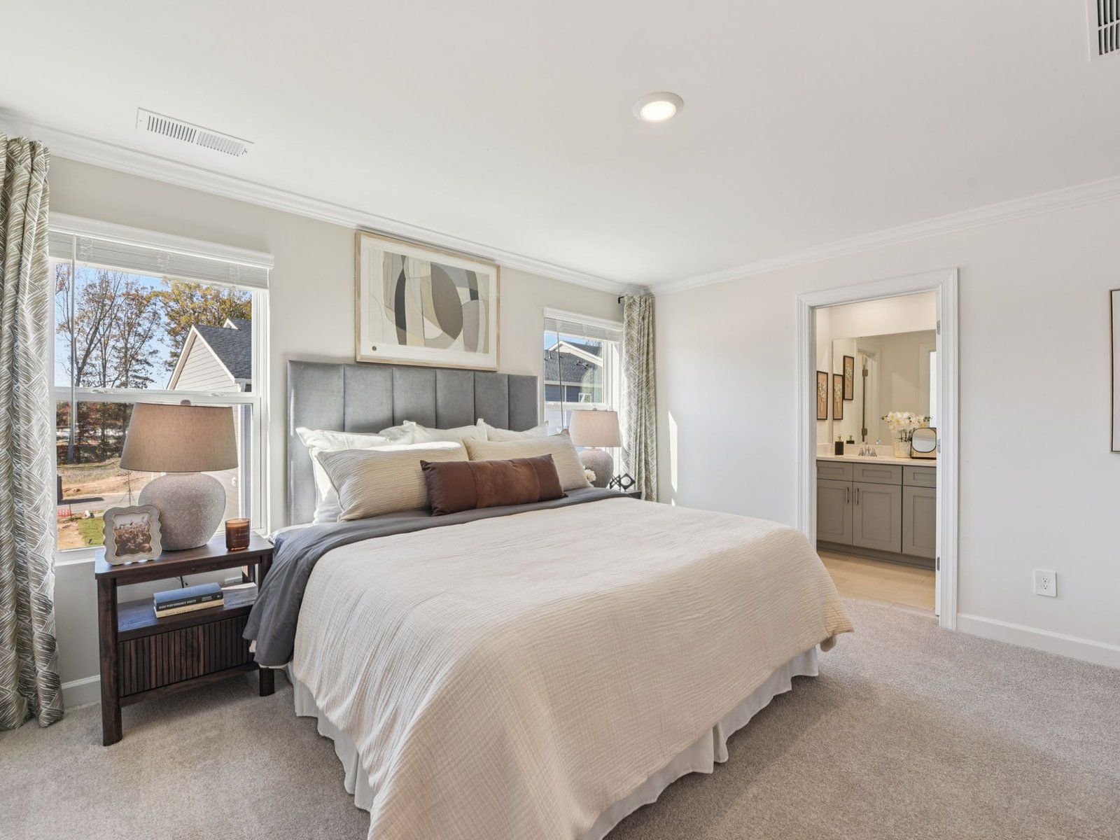 The primary bedroom connects to your own personal ensuite.