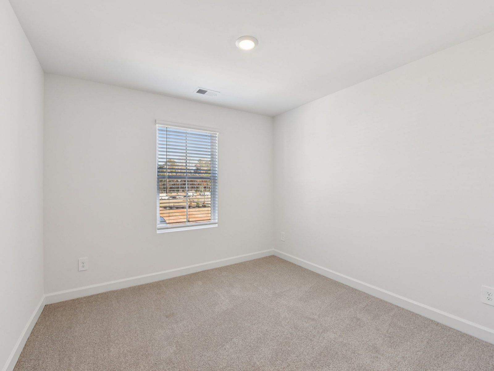 Turn a secondary bedroom into your work-from-home office space.
