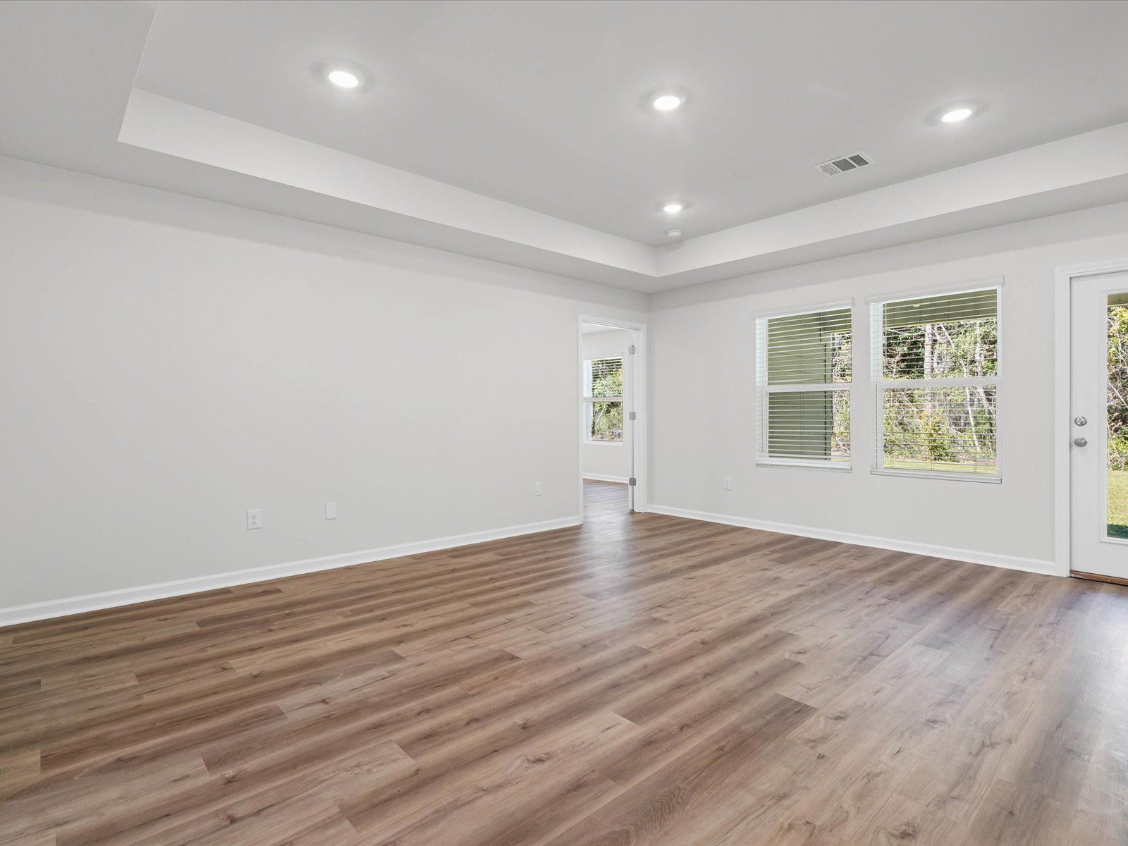 Living room in the Opal floorplan at a Meritage Homes community in Ocean Springs, MS.