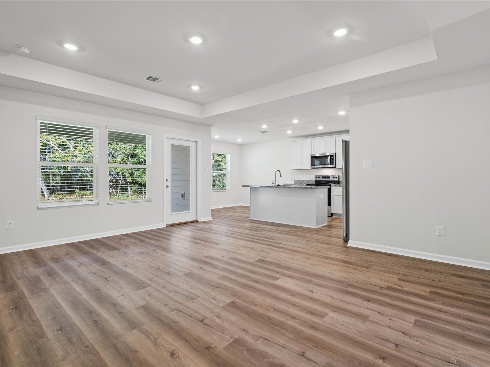 Living room in the Opal floorplan at a Meritage Homes community in Ocean Springs, MS.