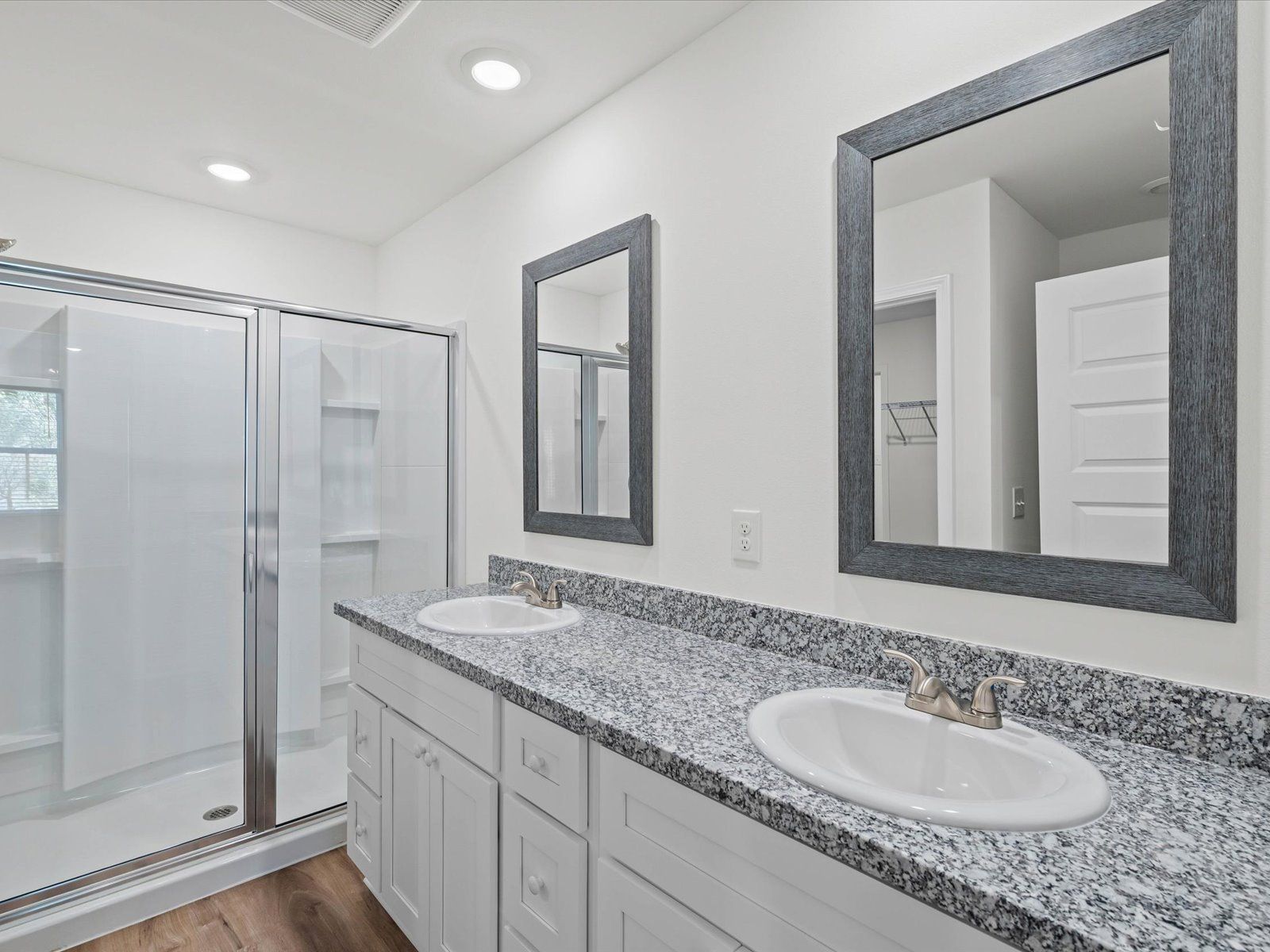 Primary bathroom in the Opal floorplan at a Meritage Homes community in Ocean Springs, MS.