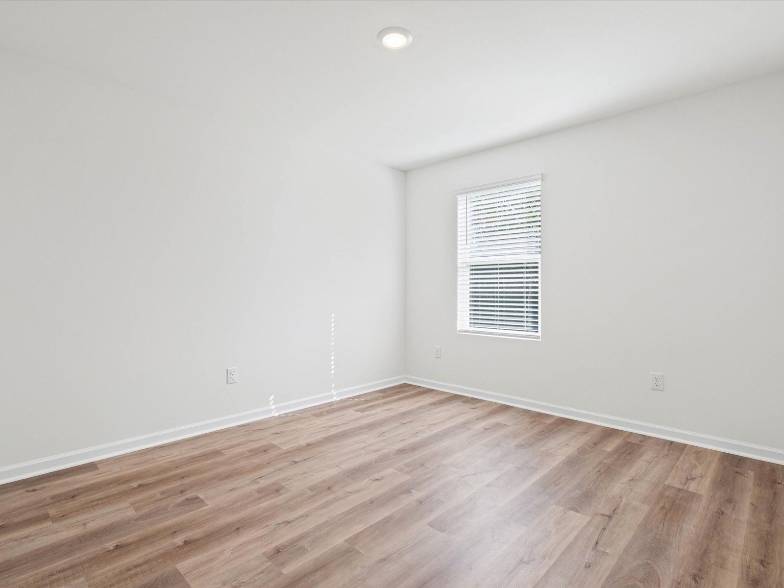Secondary bedroom in the Dune floorplan at a Meritage Homes community in Ocean Springs, MS.