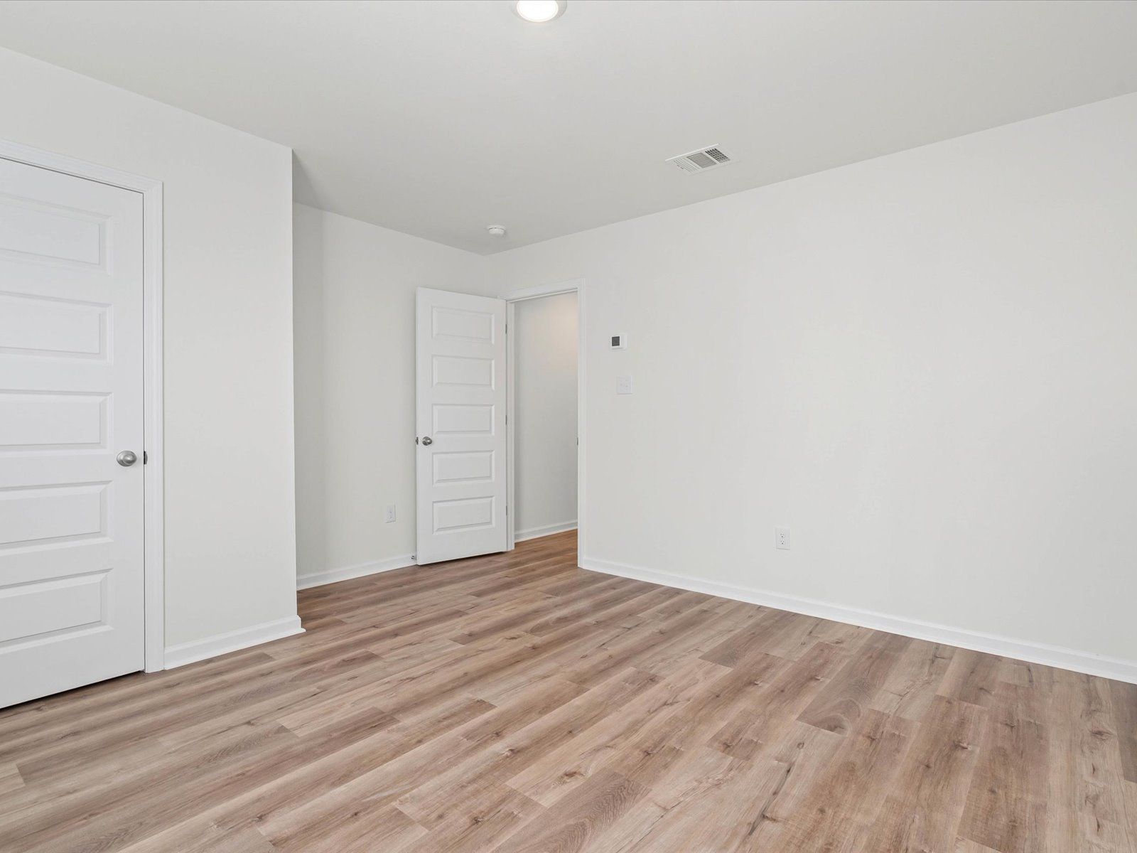 Secondary bedroom in the Dune floorplan at a Meritage Homes community in Ocean Springs, MS.