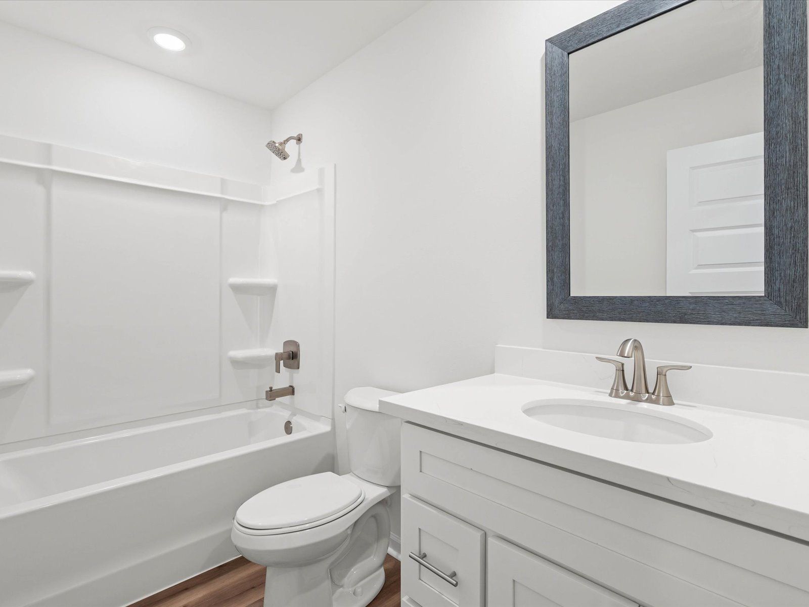 Secondary bathroom in the Dune floorplan at a Meritage Homes community in Ocean Springs, MS.