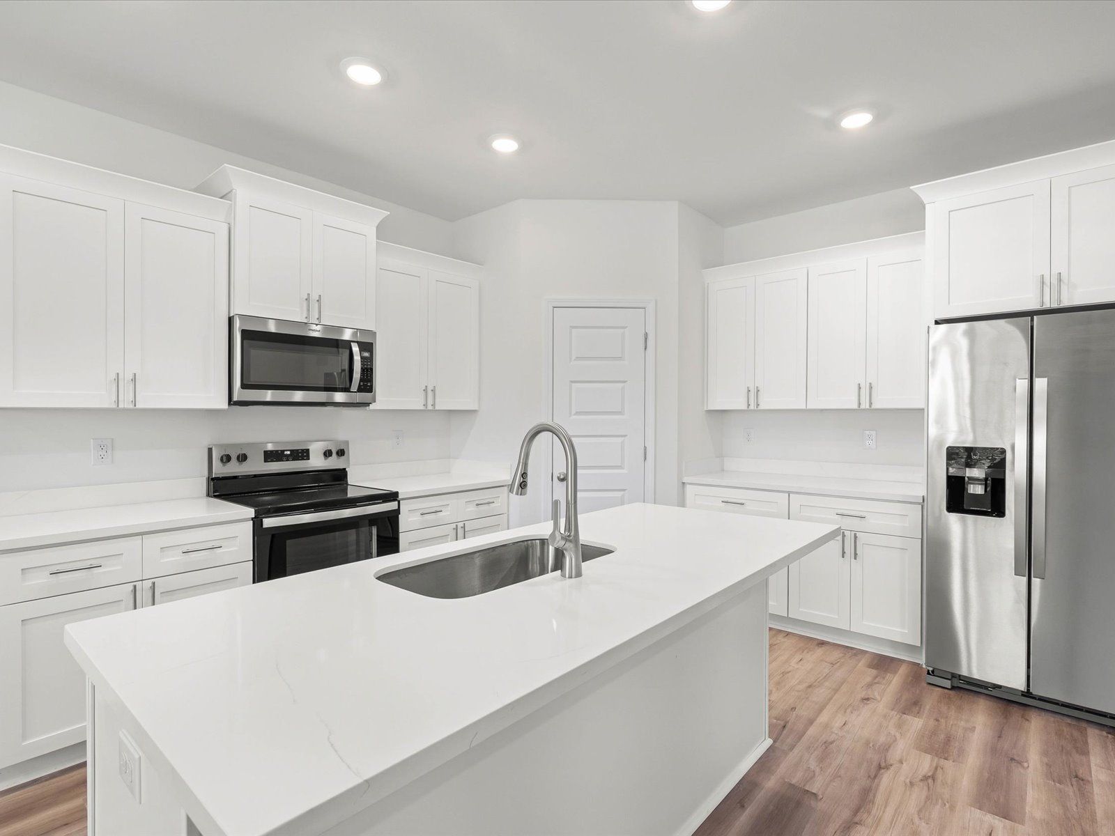 Kitchen in the Dune floorplan at a Meritage Homes community in Ocean Springs, MS.