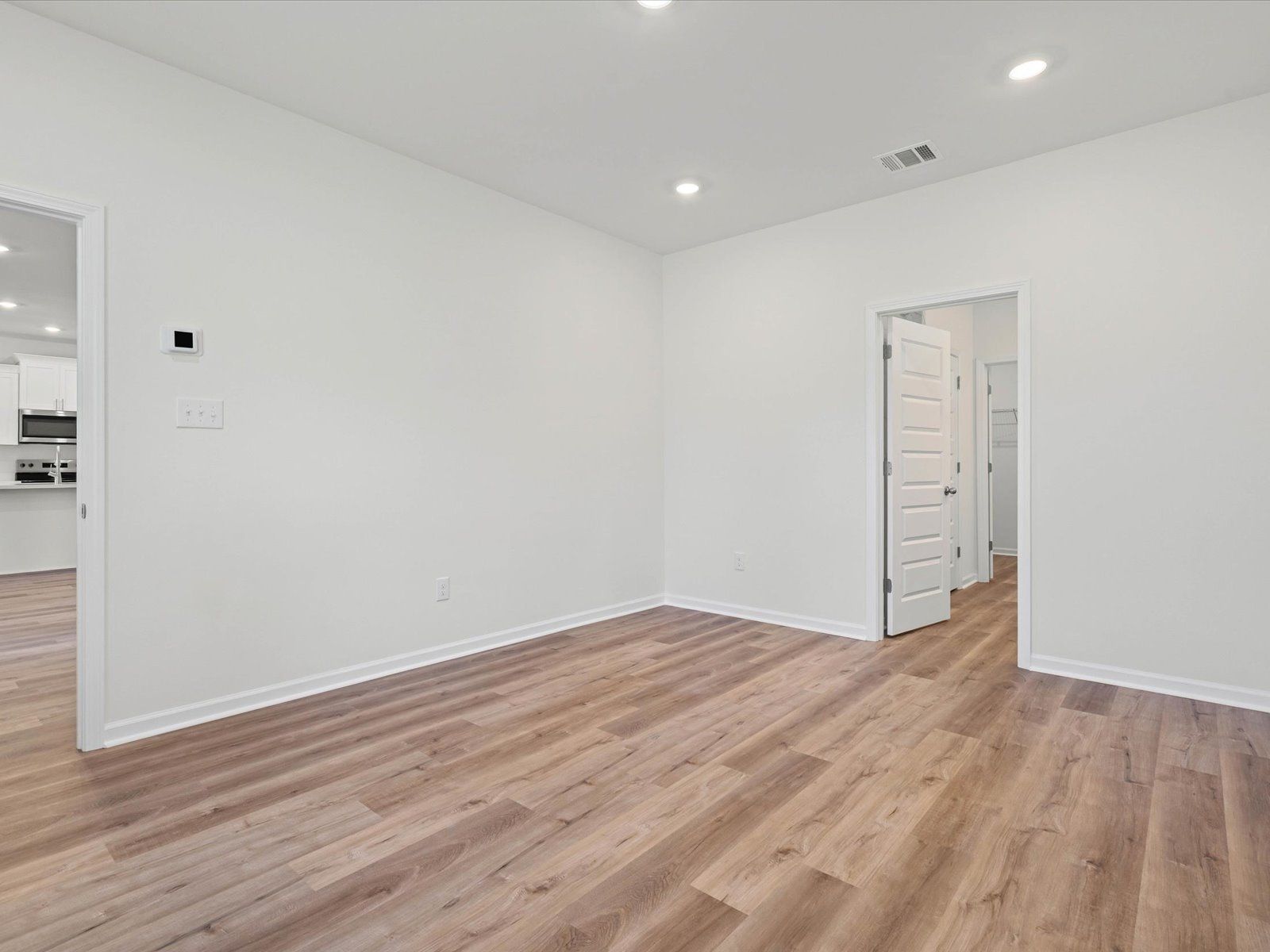 Primary bedroom in the Dune floorplan at a Meritage Homes community in Ocean Springs, MS.