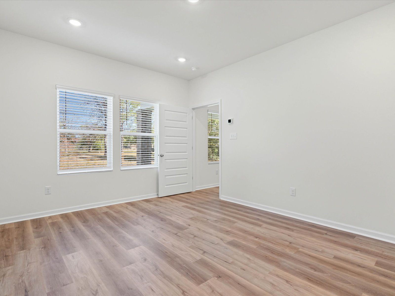 Primary bedroom in the Dune floorplan at a Meritage Homes community in Ocean Springs, MS.