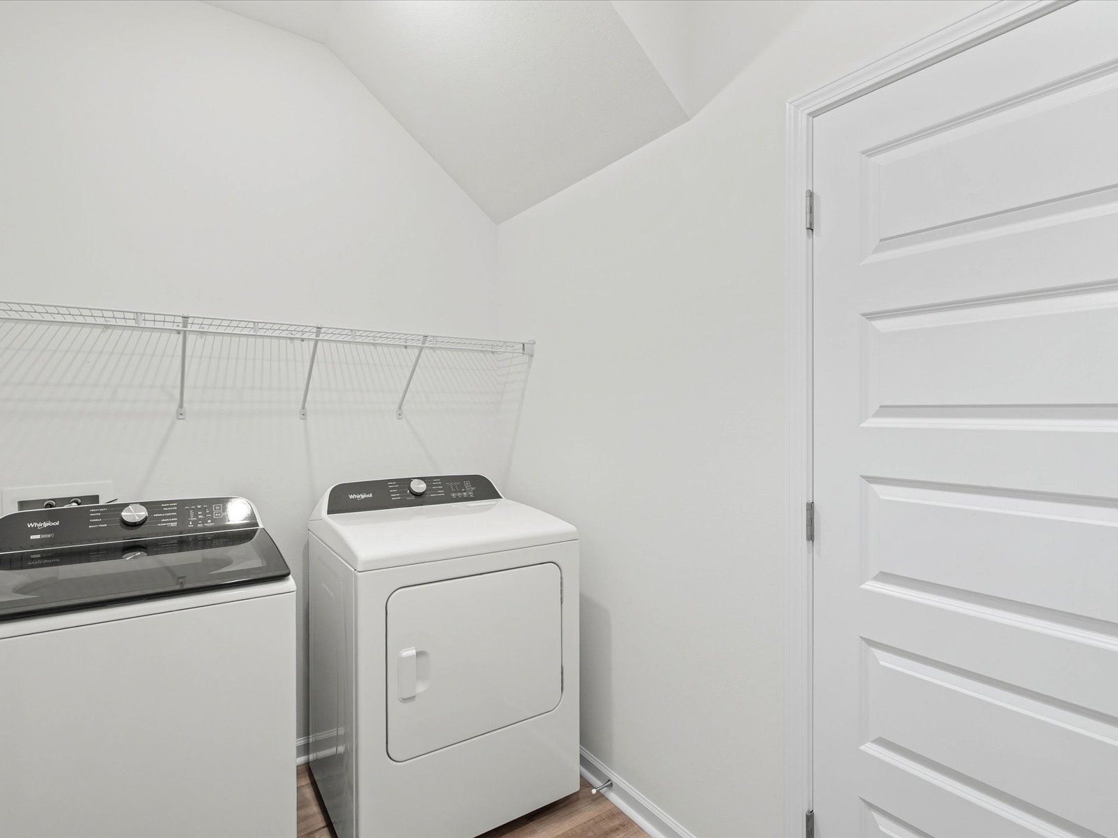 Laundry room in the Dune floorplan at a Meritage Homes community in Ocean Springs, MS.