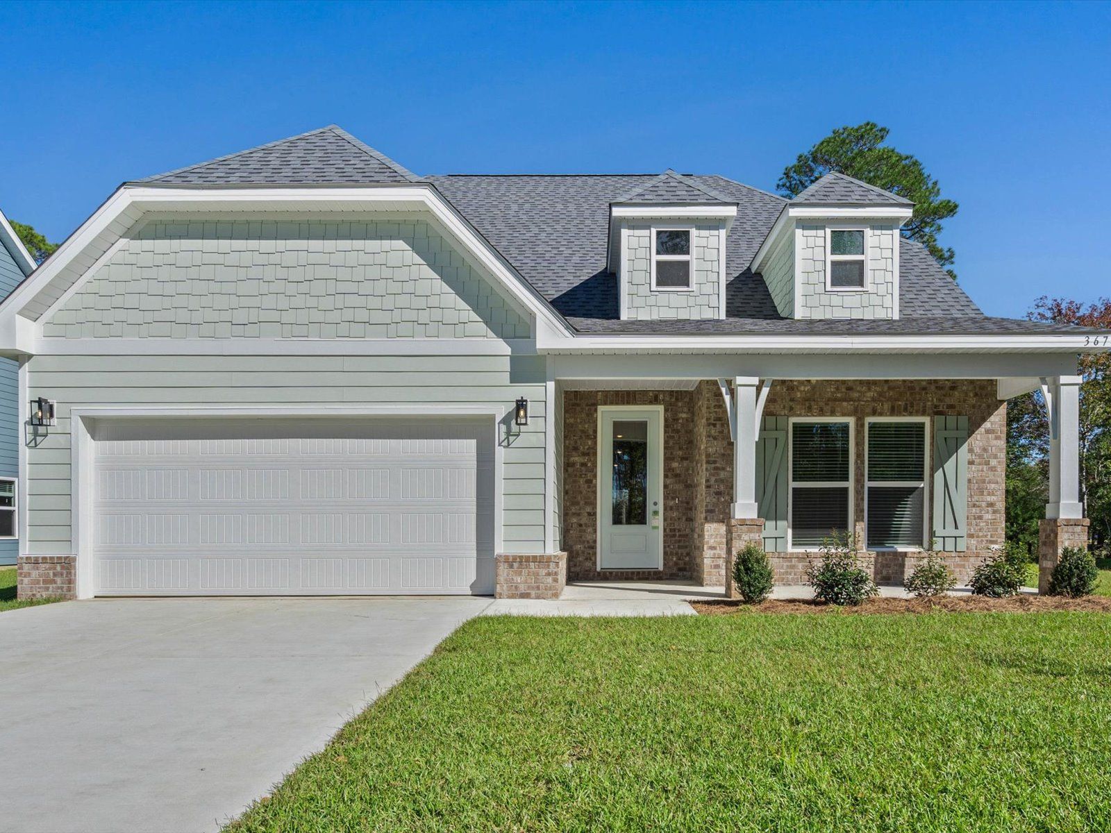 Dune front exterior at a Meritage Homes community in Ocean Springs, MS.