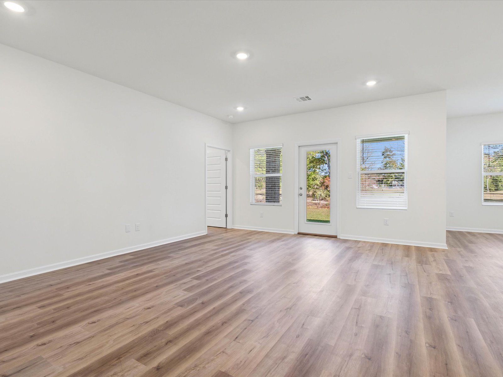 Living room in the Dune floorplan at a Meritage Homes community in Ocean Springs, MS.