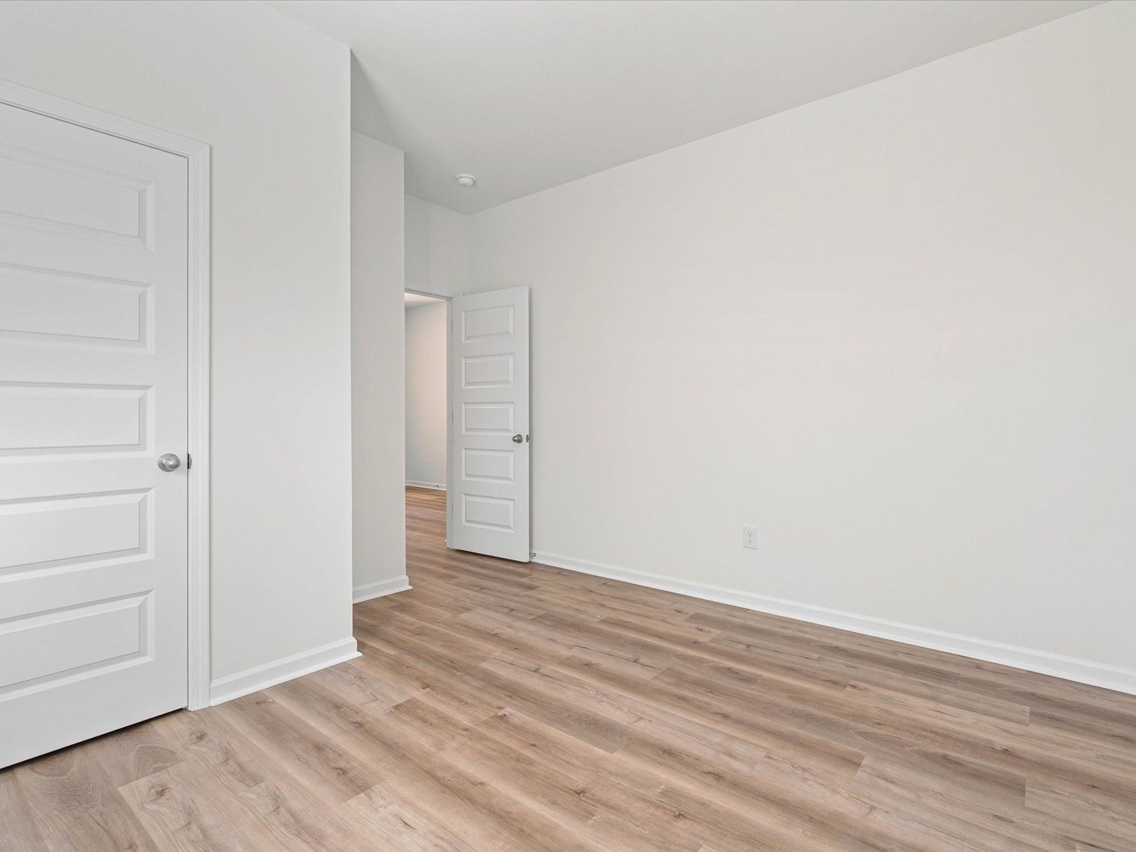 Secondary bedroom in the Dune floorplan at a Meritage Homes community in Ocean Springs, MS.