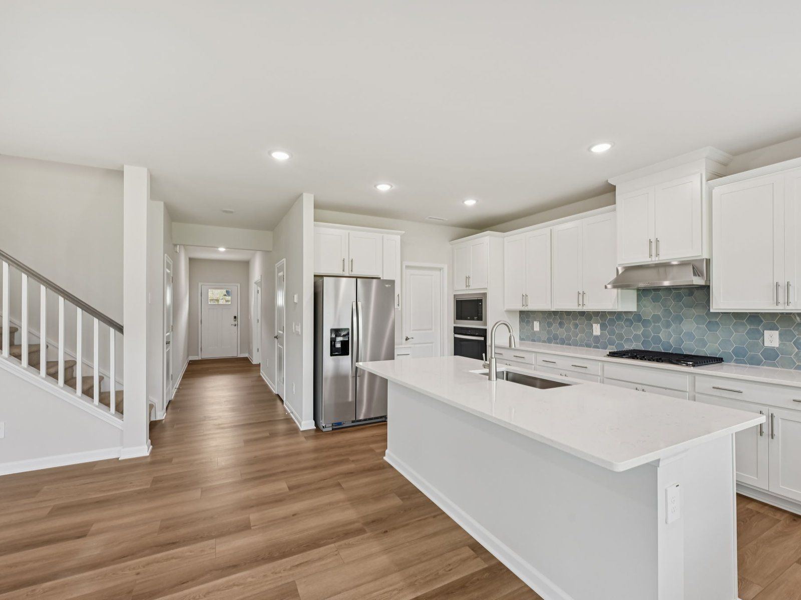 Kitchen in the Dakota floorplan at a Meritage Homes community in Garner, NC.