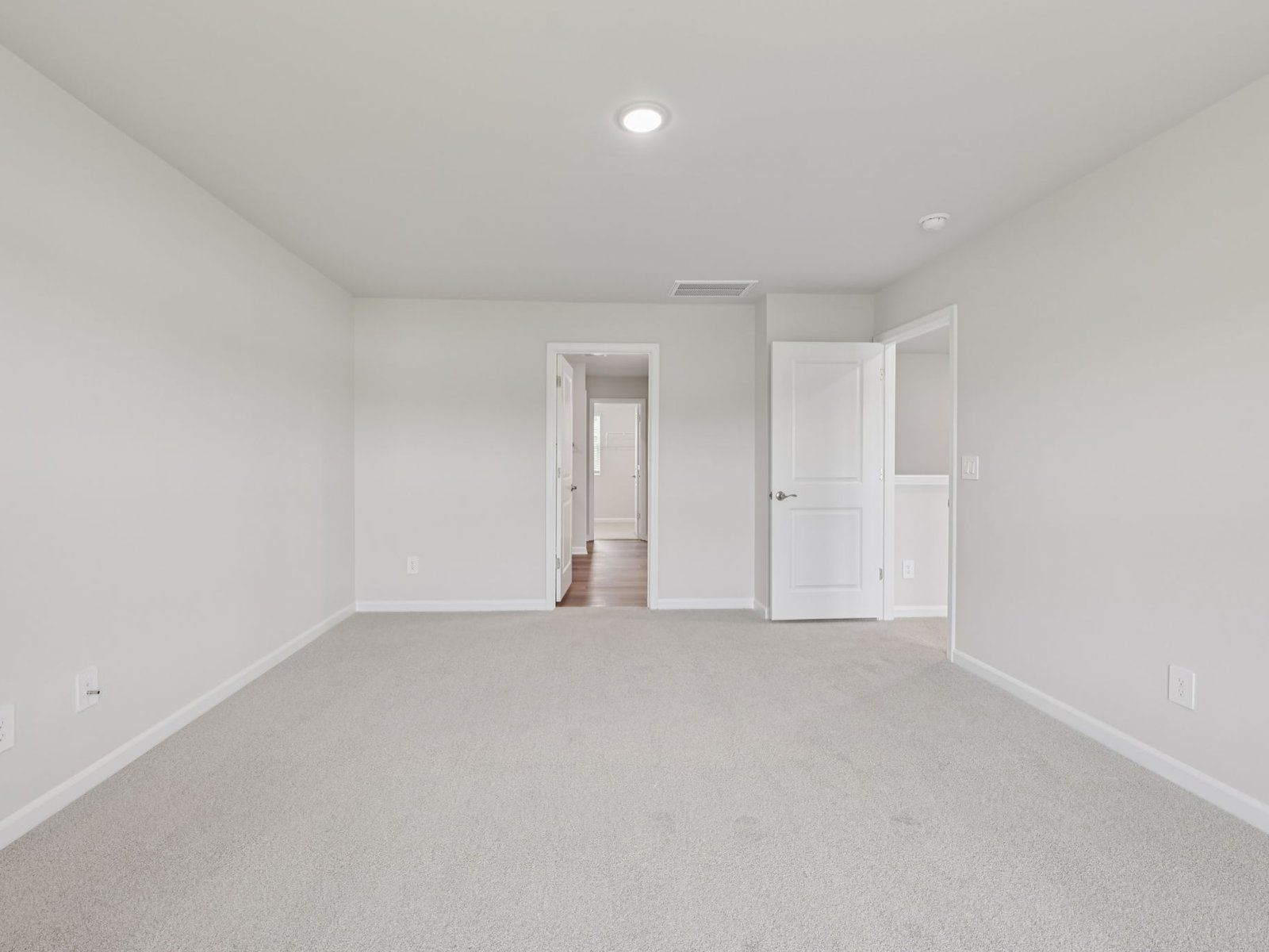 Primary bedroom in the Dakota floorplan at a Meritage Homes community in Garner, NC.