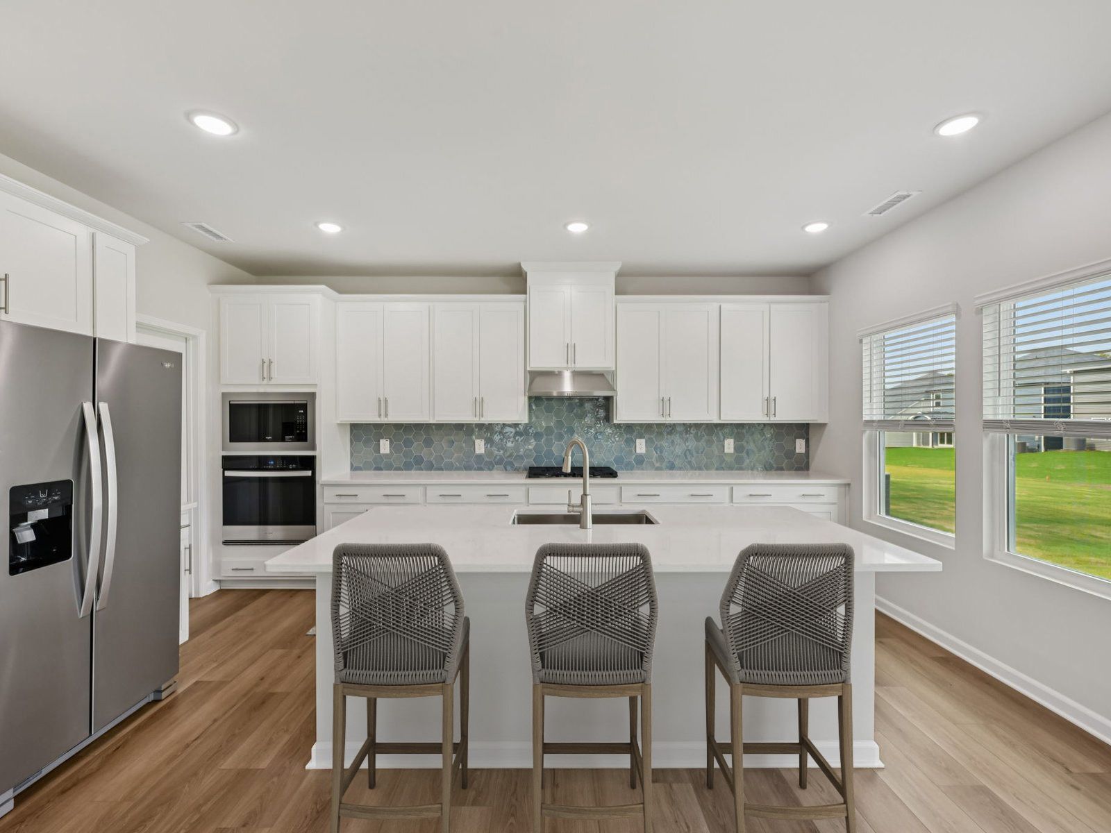 Kitchen in the Dakota floorplan at a Meritage Homes community in Garner, NC.