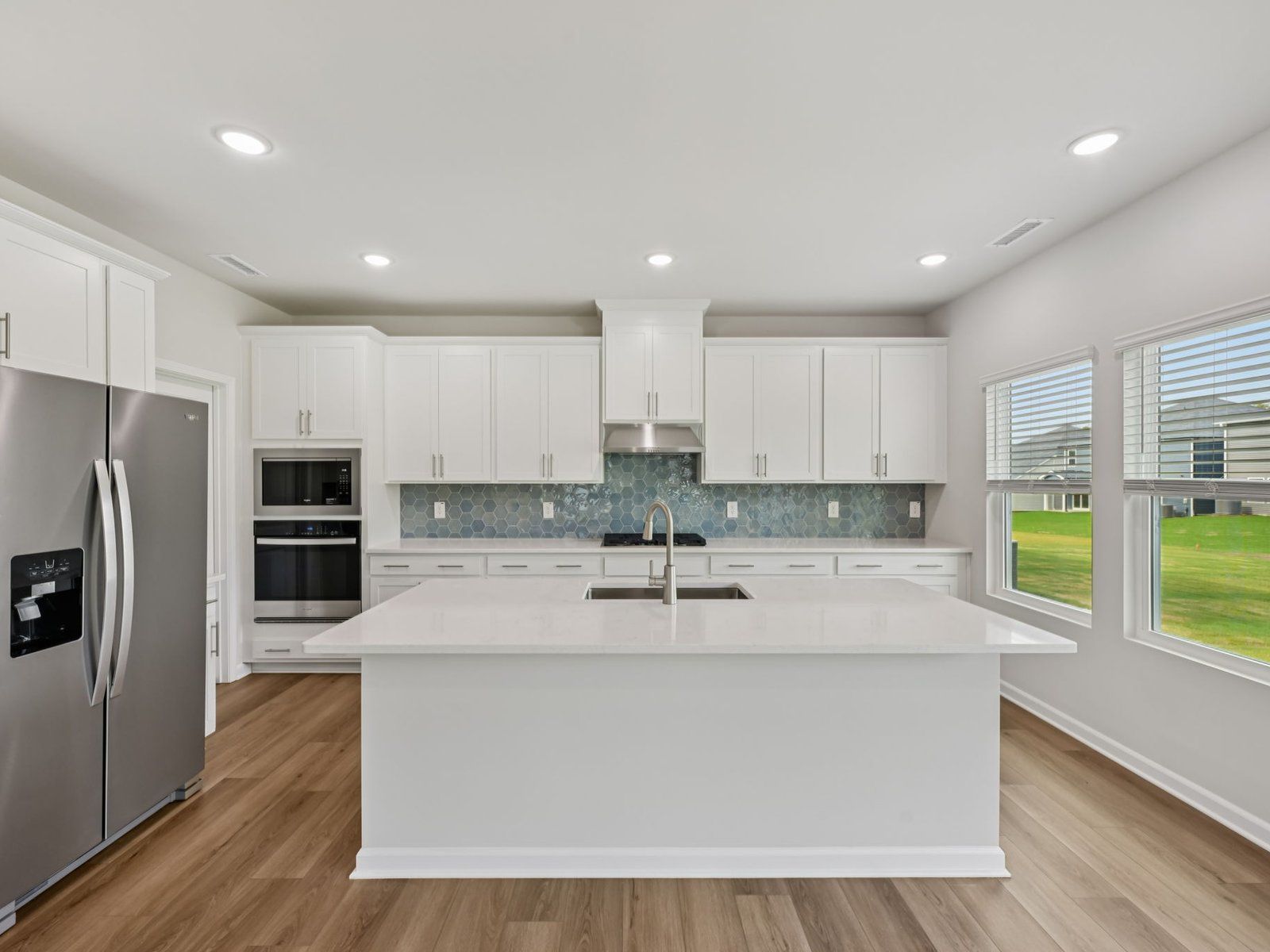 Kitchen in the Dakota floorplan at a Meritage Homes community in Garner, NC.