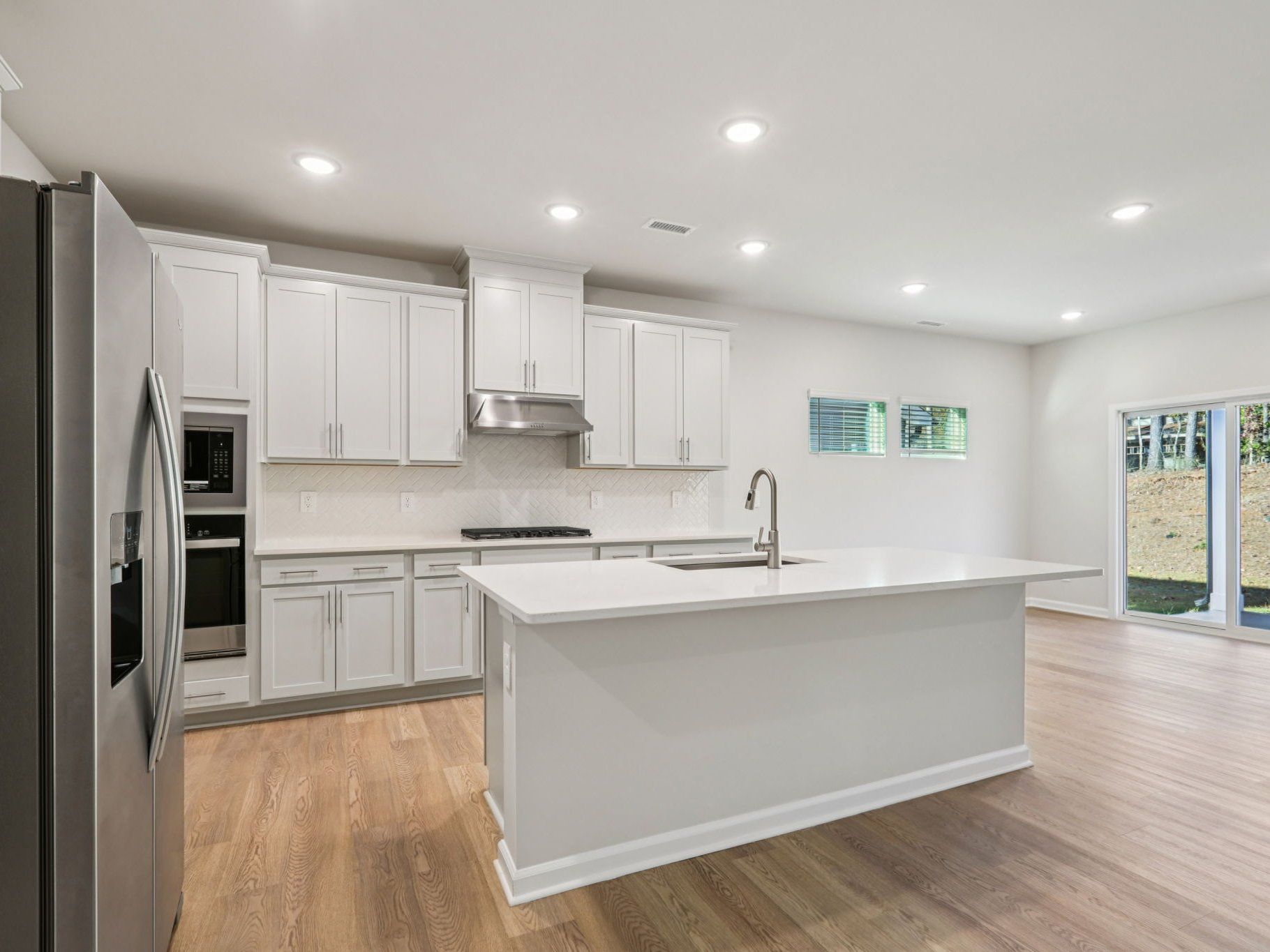Kitchen in the Johnson floorplan at a Meritage Homes community in Garner, NC.
