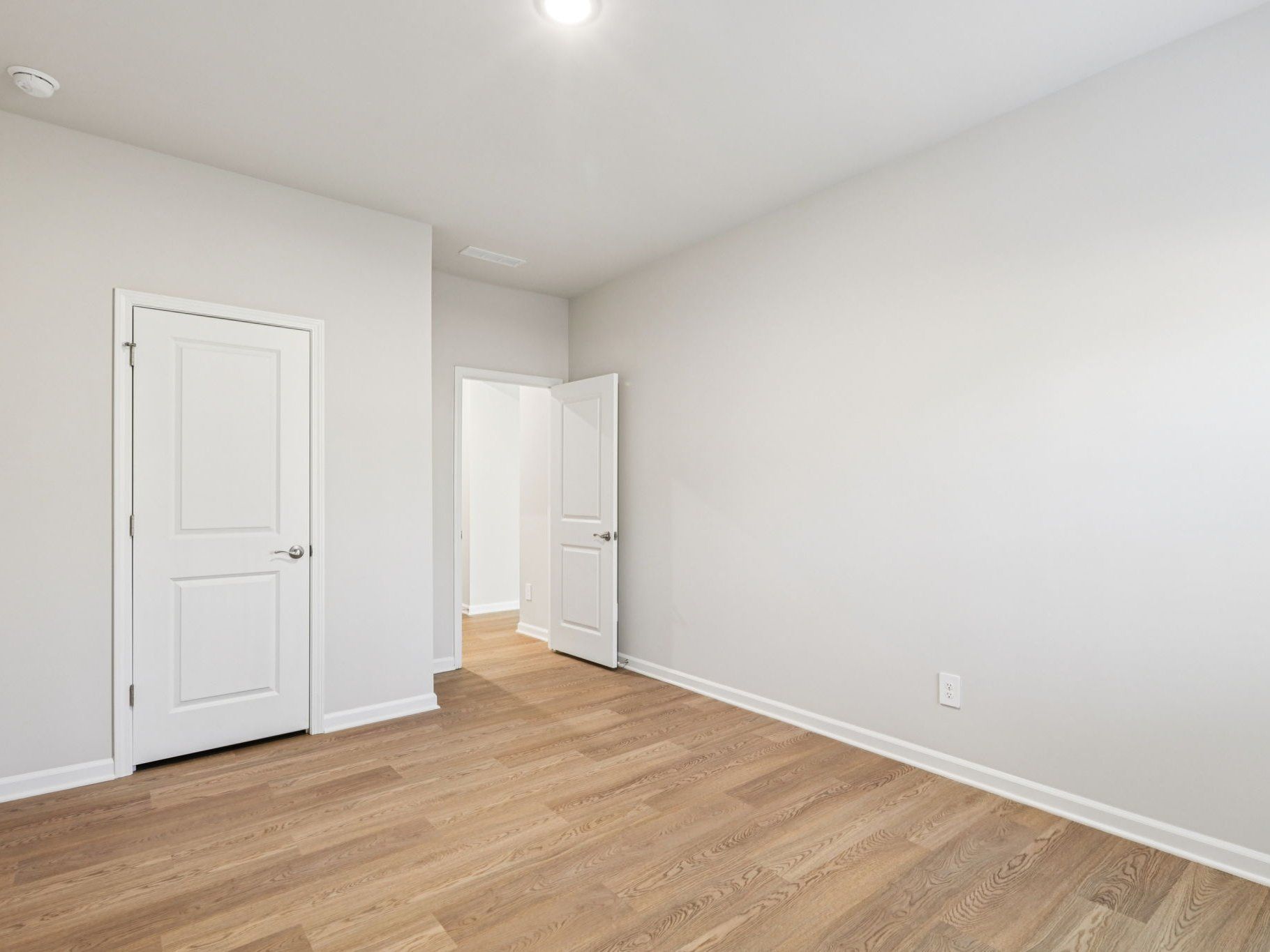 Secondary bedroom in the Johnson floorplan at a Meritage Homes community in Garner, NC.