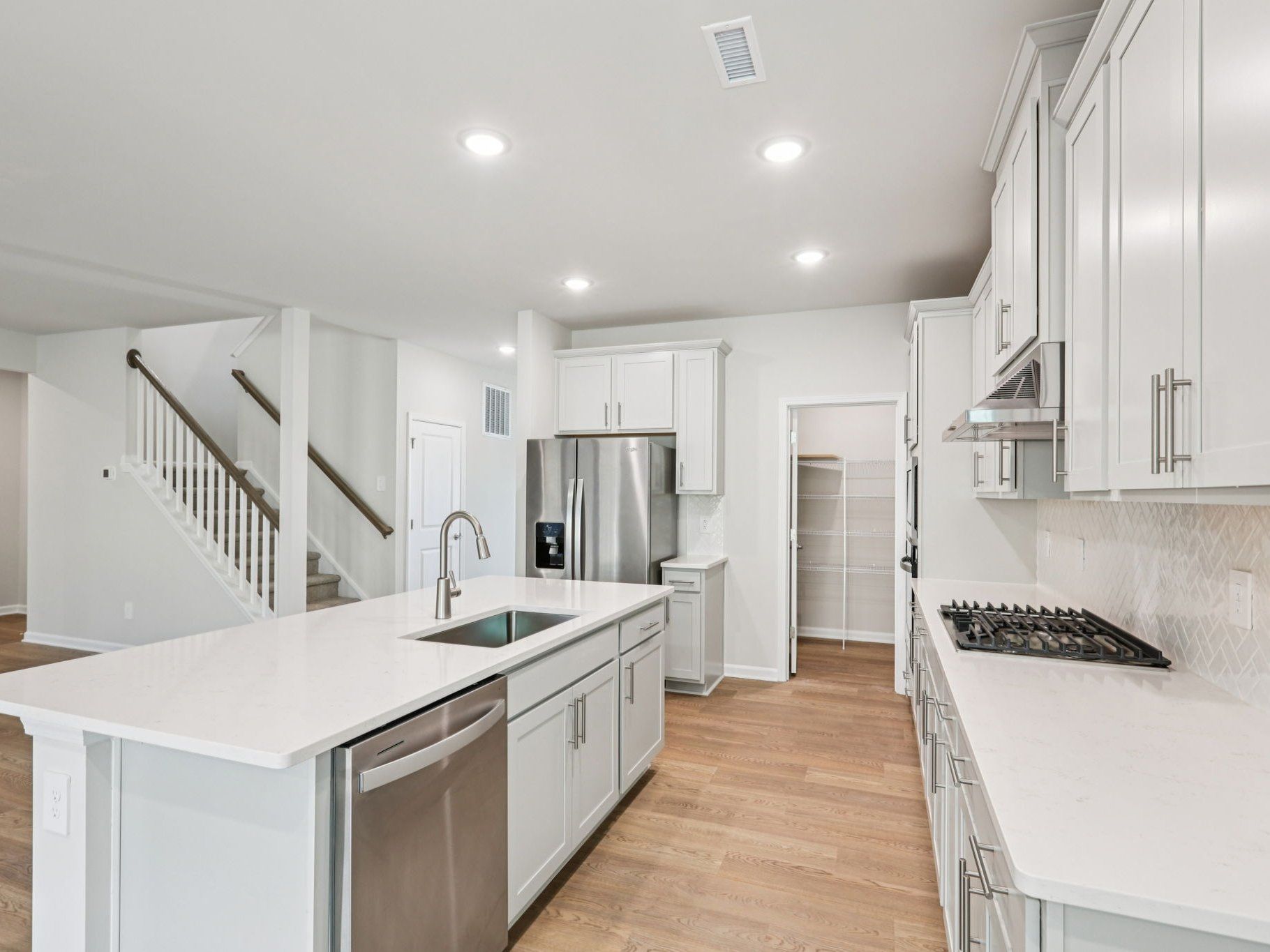 Kitchen in the Johnson floorplan at a Meritage Homes community in Garner, NC.