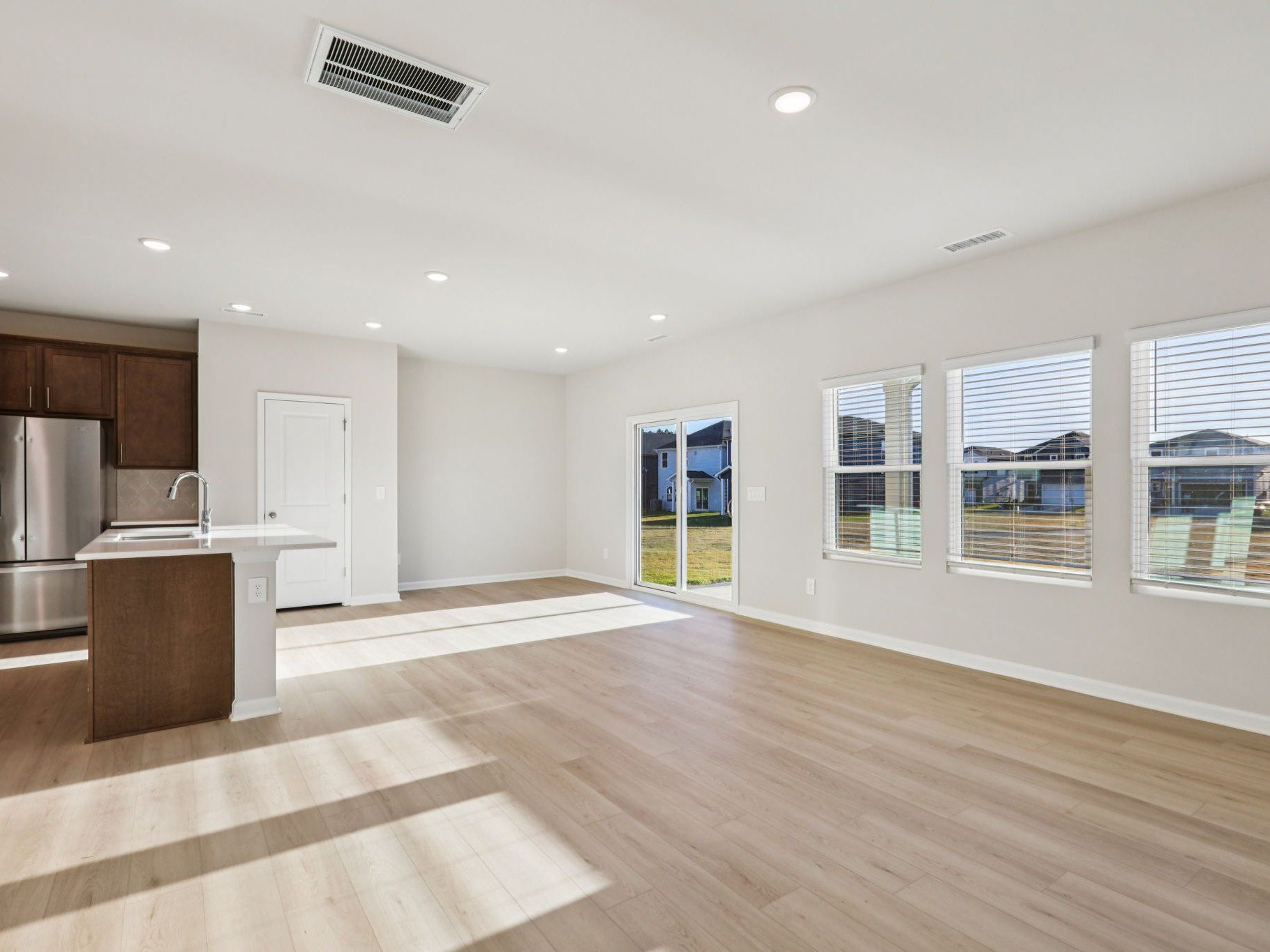 Great room in the Lennon floorplan at a Meritage Homes community in Garner, NC.
