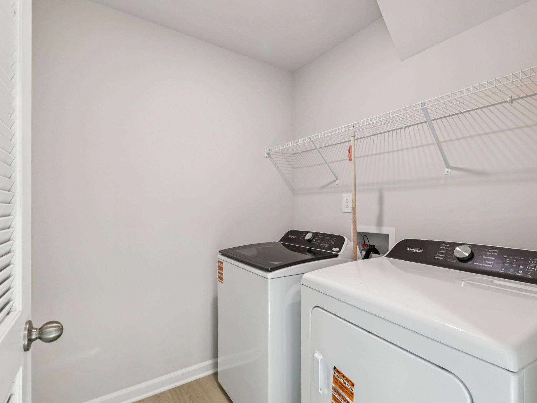 Laundry room in the Lennon floorplan at a Meritage Homes community in Garner, NC.