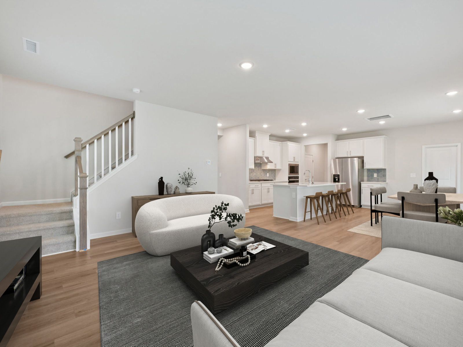 Great room in the Brentwood floorplan at a Meritage Homes community in Garner, NC.