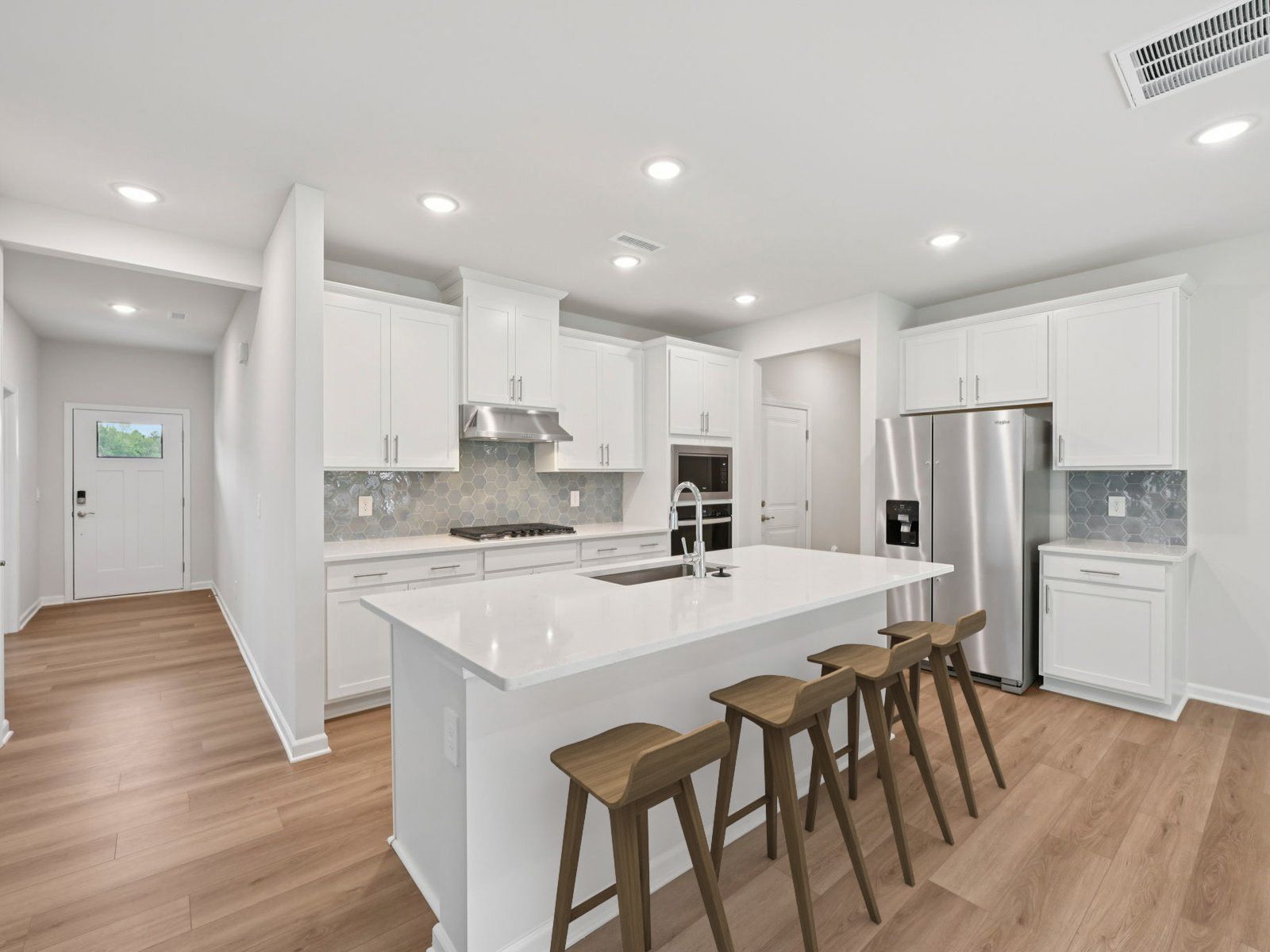 Kitchen in the Brentwood floorplan at a Meritage Homes community in Garner, NC.