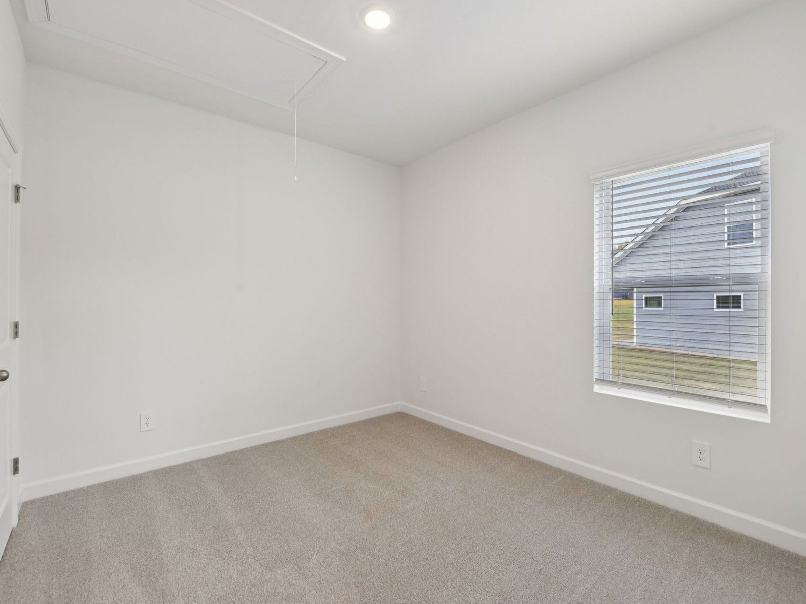Turn a secondary bedroom into your personal work-from-home office.