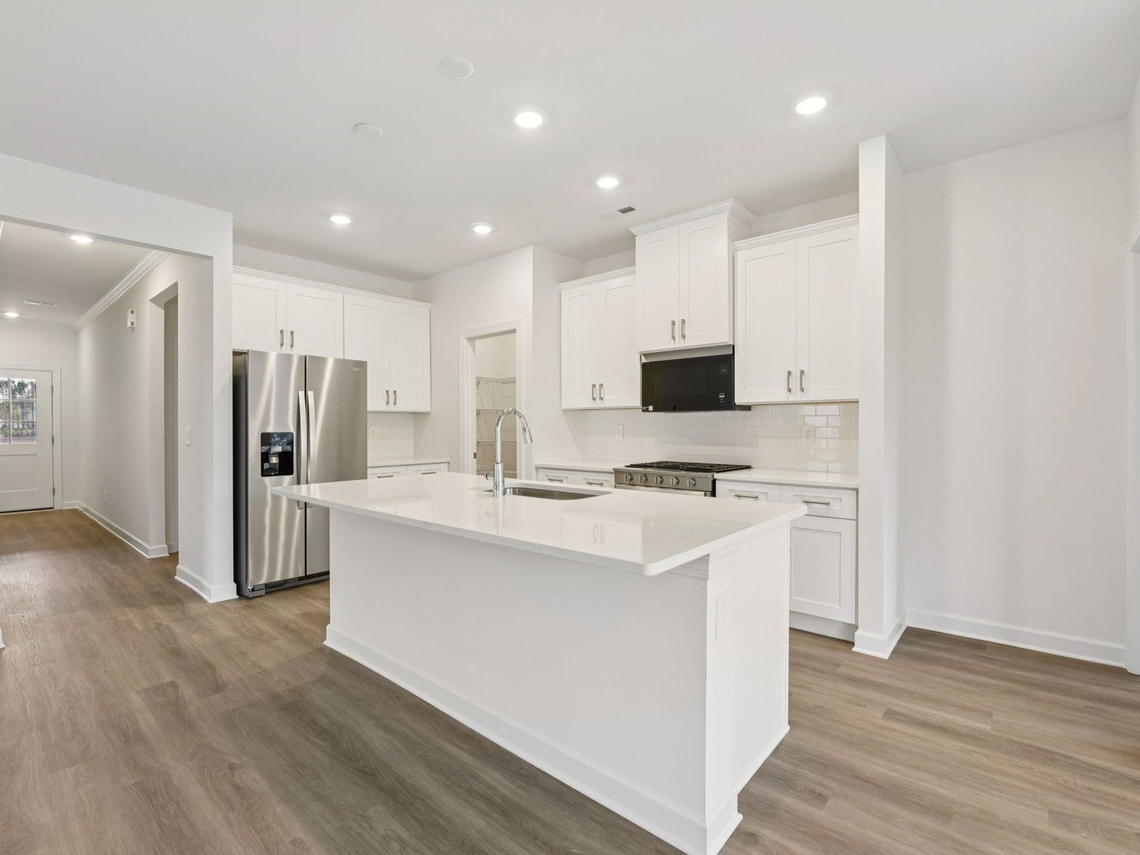 Cook your favorite meals in the sleek, modern kitchen.