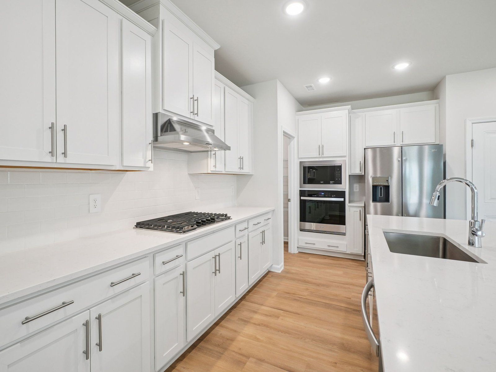 Kitchen in the Paisley floorplan at a Meritage Homes community in Garner, NC.