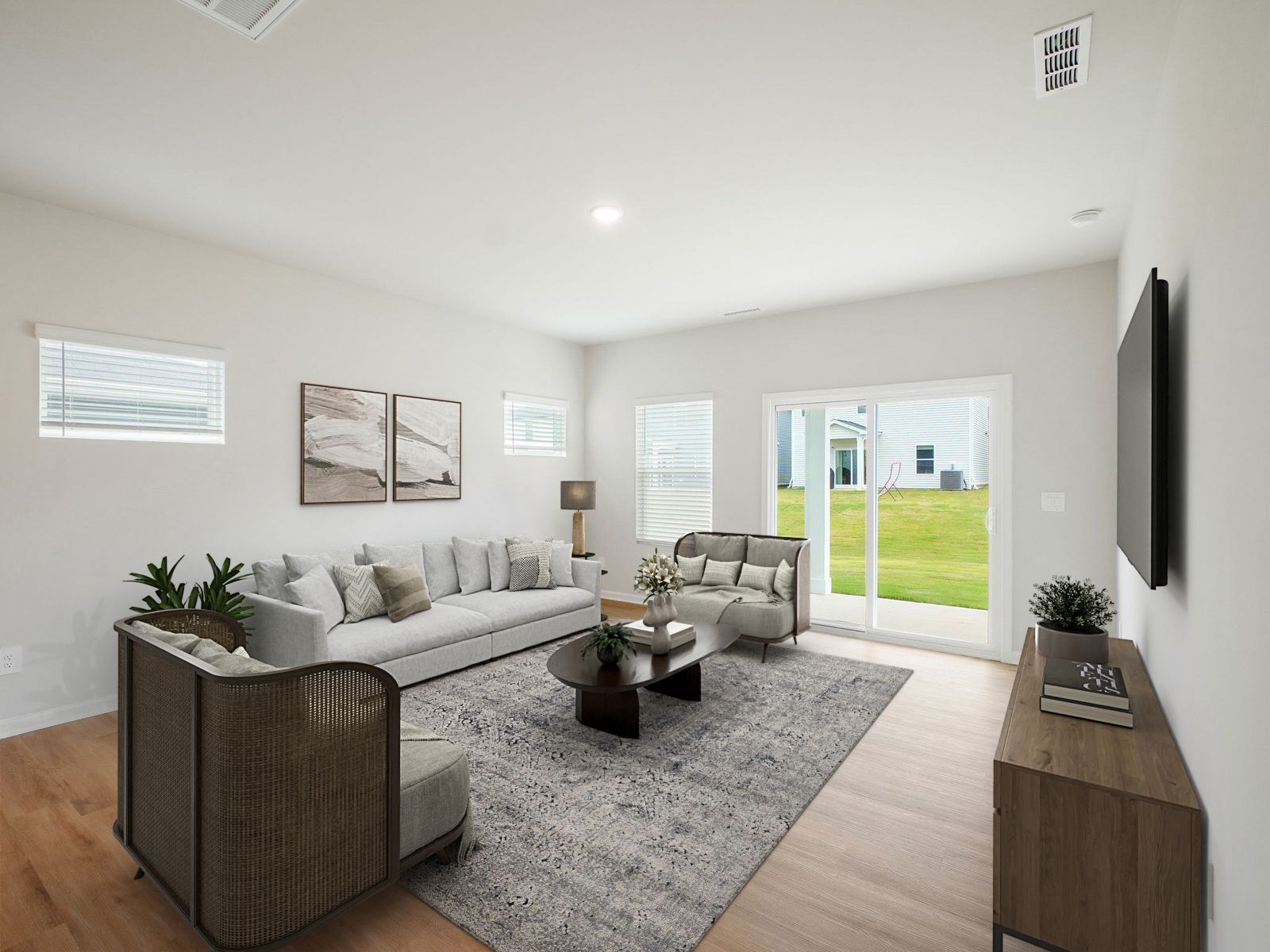 Great room in the Paisley floorplan at a Meritage Homes community in Garner, NC.