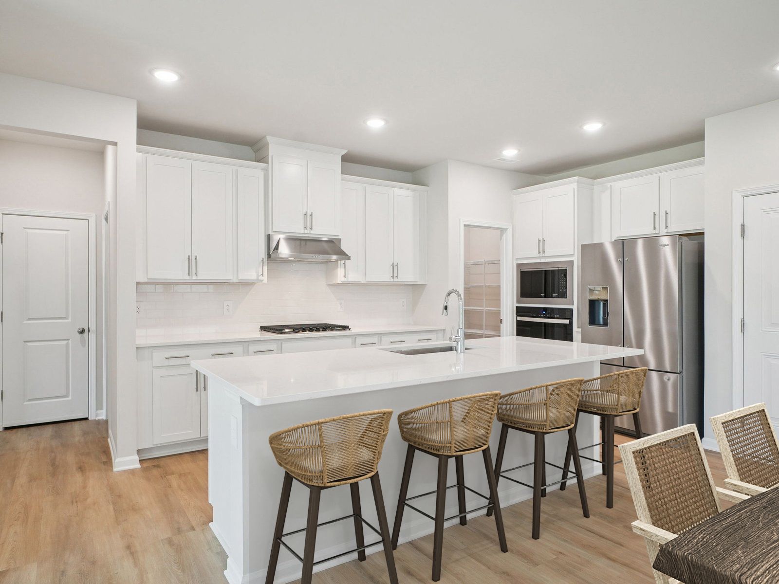 Kitchen in the Paisley floorplan at a Meritage Homes community in Garner, NC.