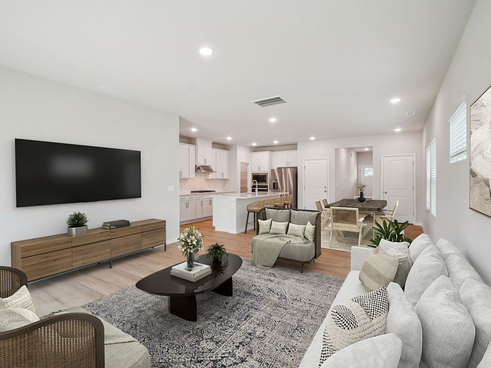 Great room in the Paisley floorplan at a Meritage Homes community in Garner, NC.