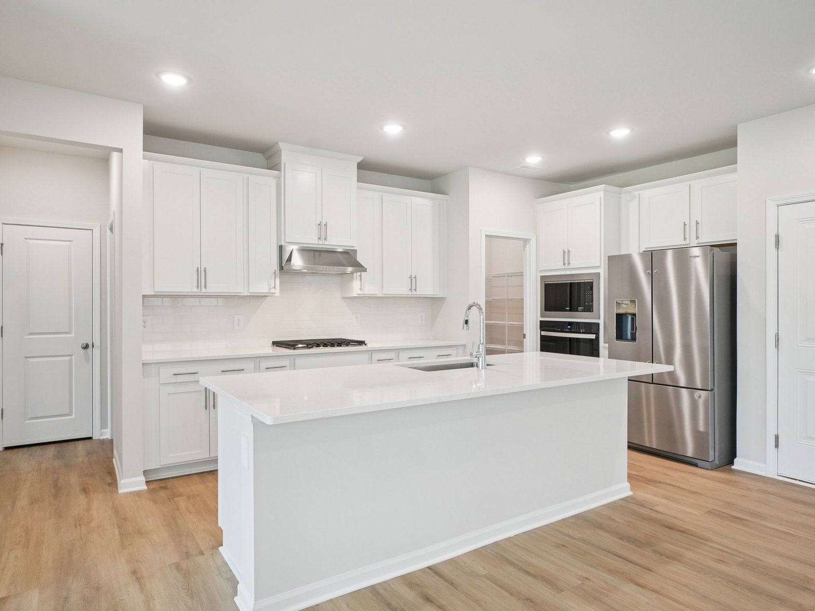 Kitchen in the Paisley floorplan at a Meritage Homes community in Garner, NC.