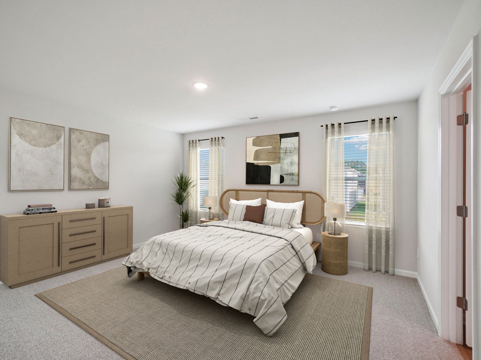Primary bedroom in the Paisley floorplan at a Meritage Homes community in Garner, NC.