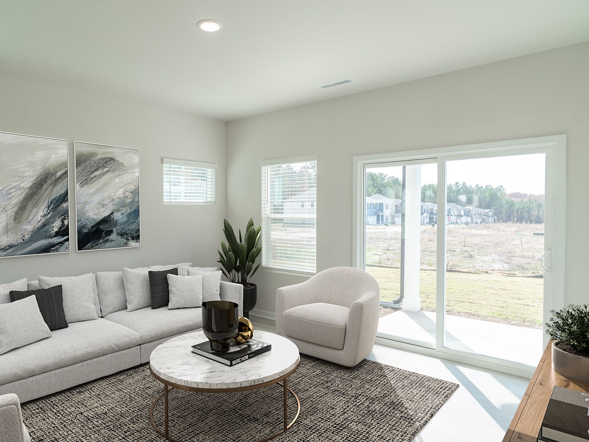 Great room in the Roswell floorplan at a Meritage Homes community in Garner, NC.