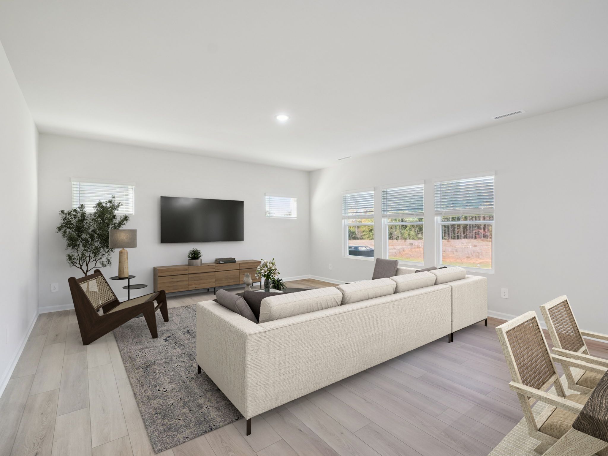 Great room in the Taylorsville floorplan at a Meritage Homes community in Garner, NC.