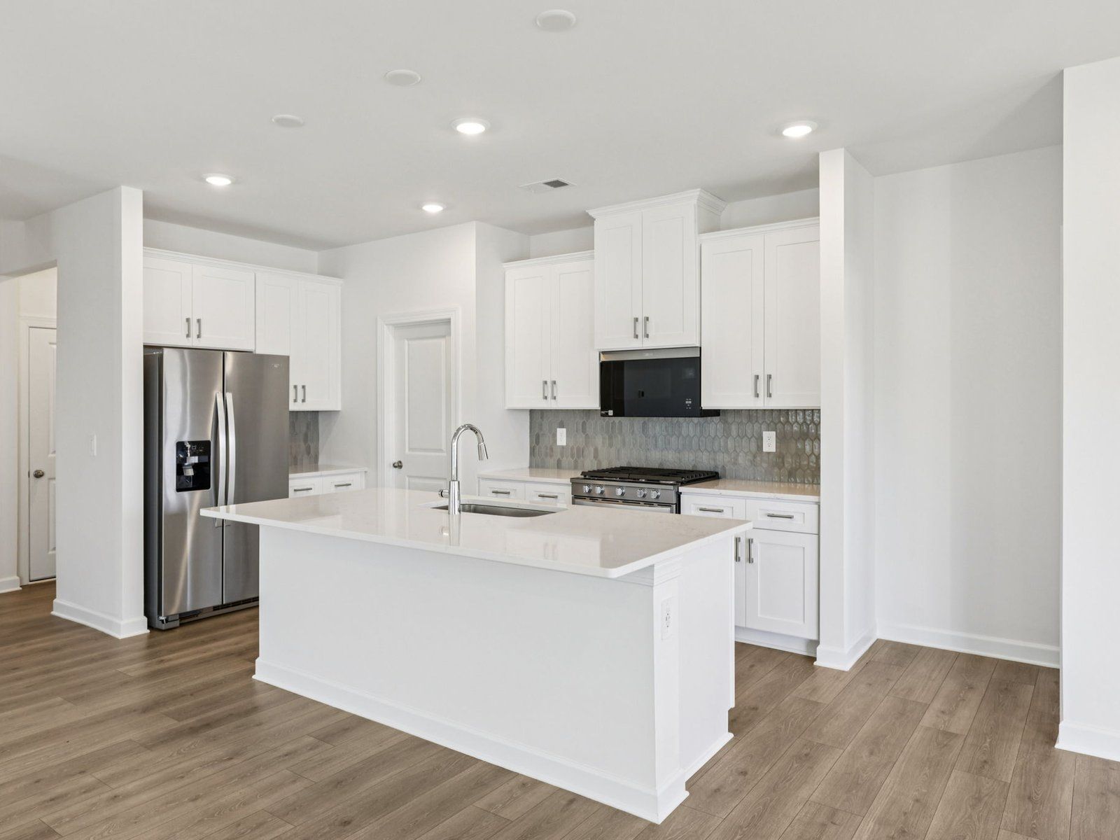 Turn the kitchen island into a bar counter for additional seating.