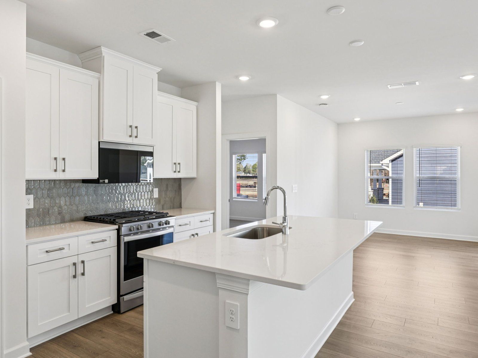 The functional kitchen layout makes meal-prep much easier.
