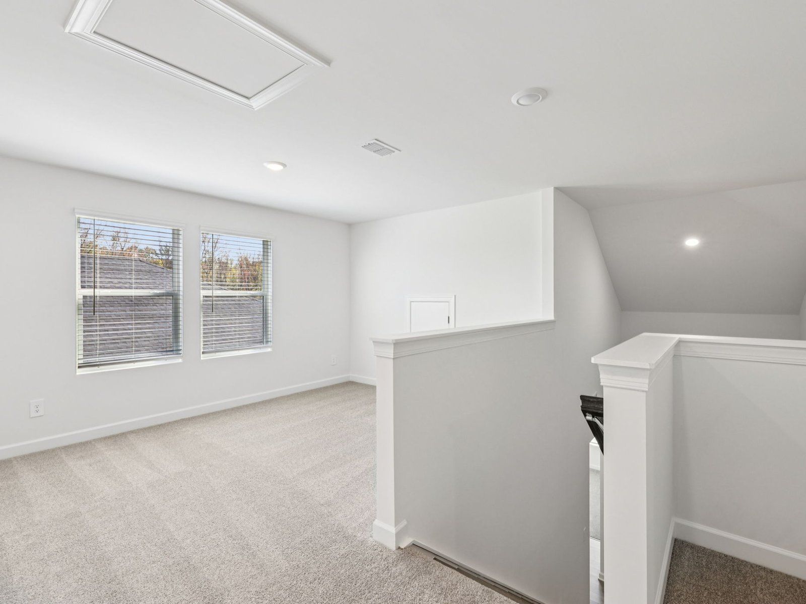 Turn the upstairs loft into a cozy lounge area.