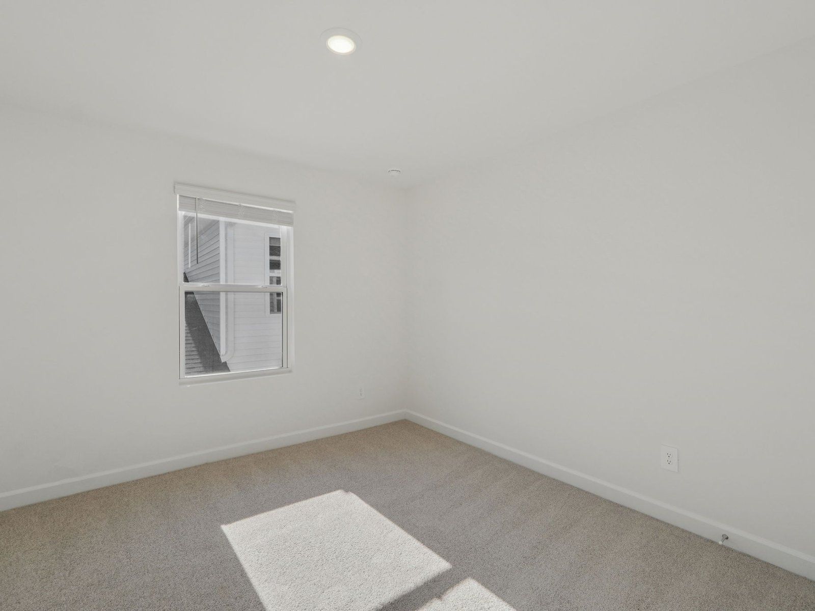 Secondary bedroom in the Vienna floorplan at a Meritage Homes community in Charlotte, NC.