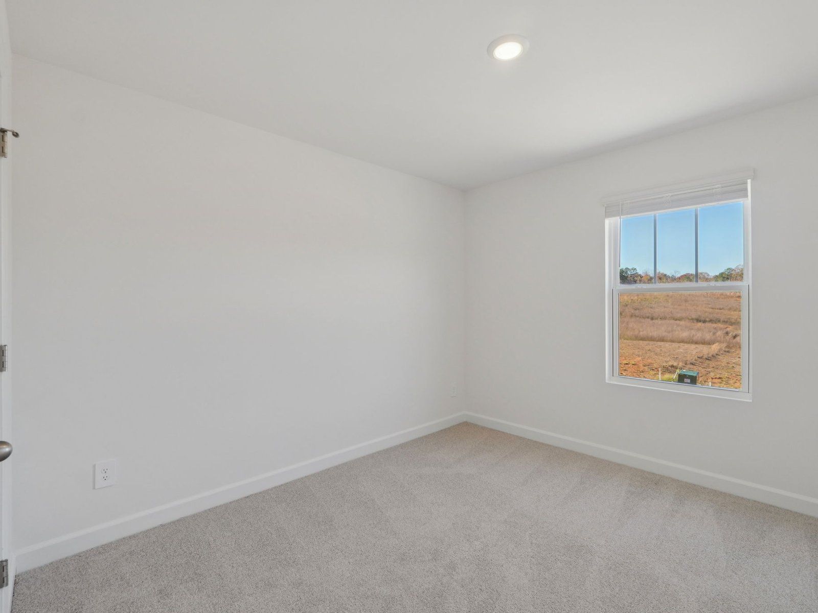 Secondary bedroom in the Vienna floorplan at a Meritage Homes community in Charlotte, NC.