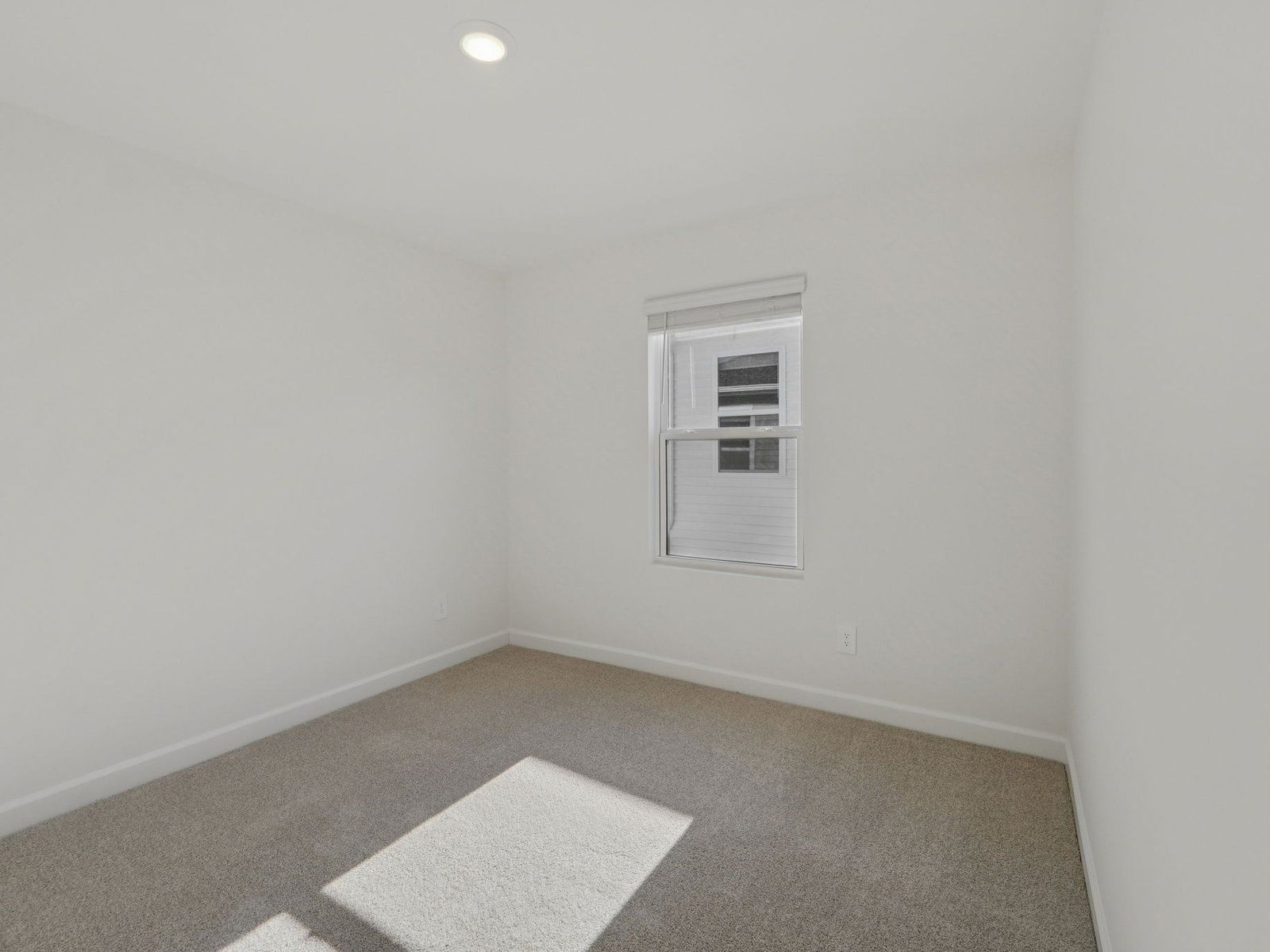 Secondary bedroom in the Vienna floorplan at a Meritage Homes community in Charlotte, NC.