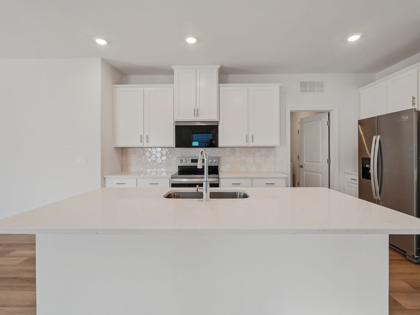 Kitchen in the Vienna floorplan at a Meritage Homes community in Charlotte, NC.