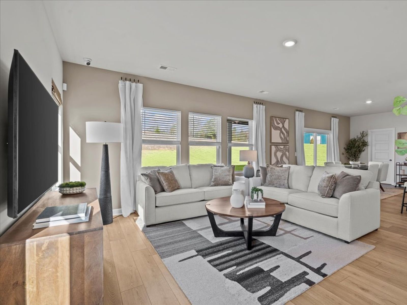 Great room in the Brentwood floorplan at a Meritage Homes community in Greenville, SC.
