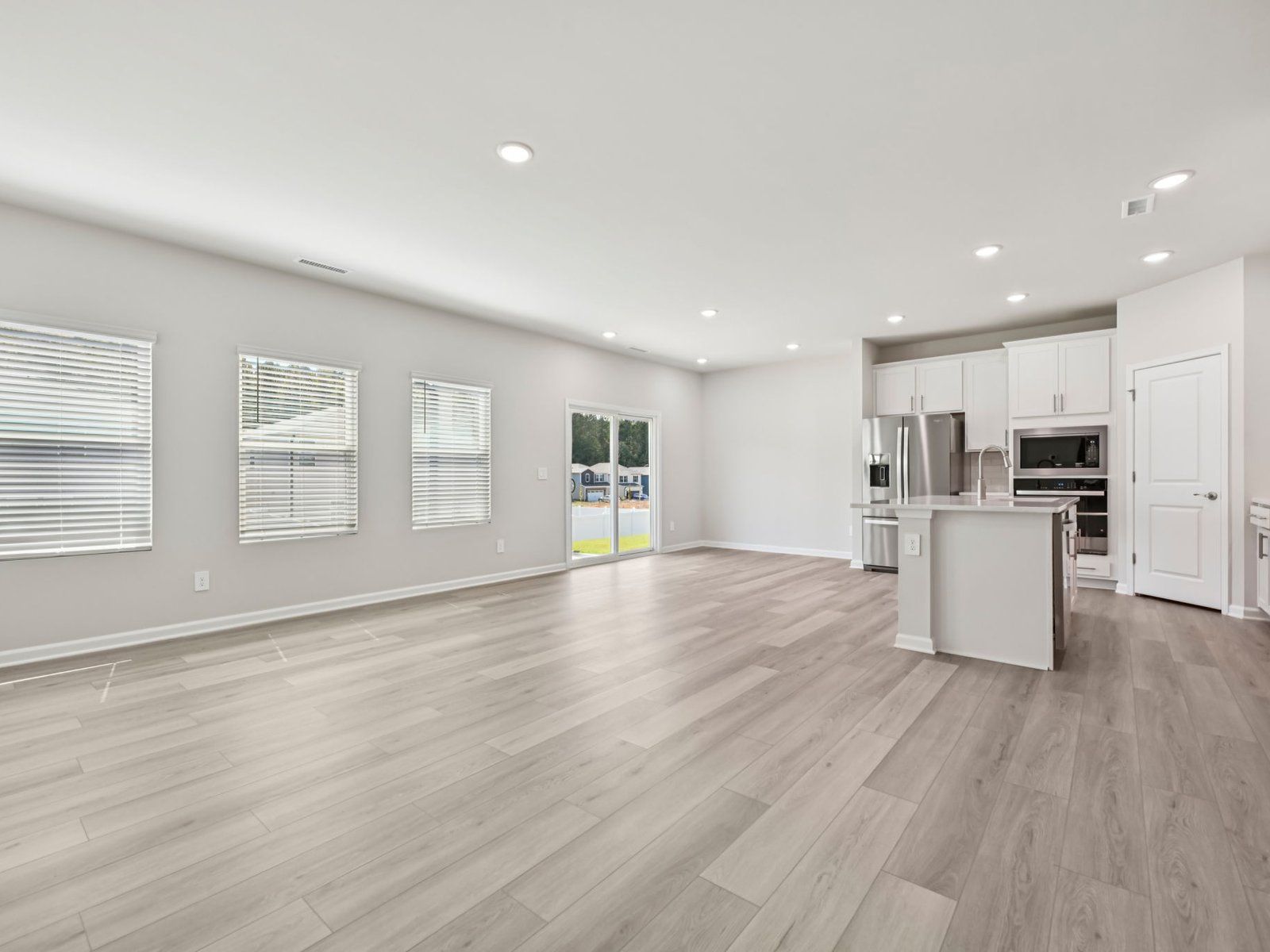 Great room in the Chatham floorplan at a Meritage Homes community in Garner, NC.