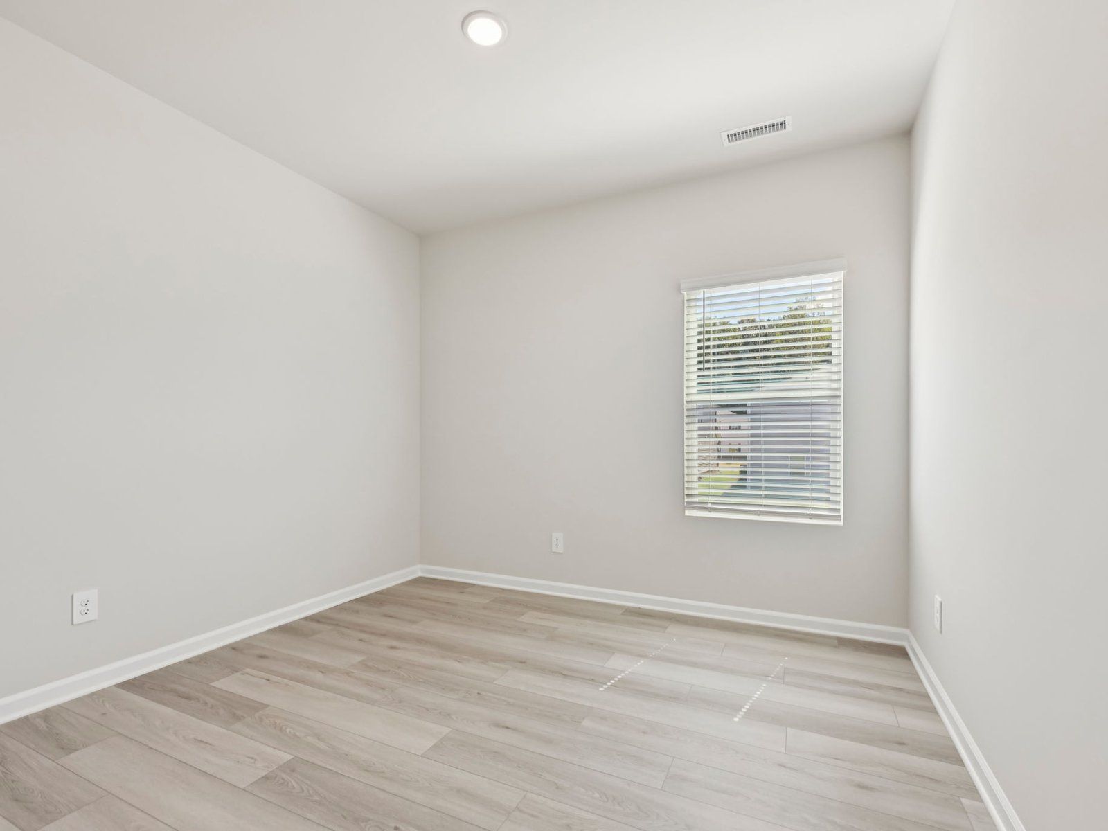 Secondary bedroom in the Chatham floorplan at a Meritage Homes community in Garner, NC.