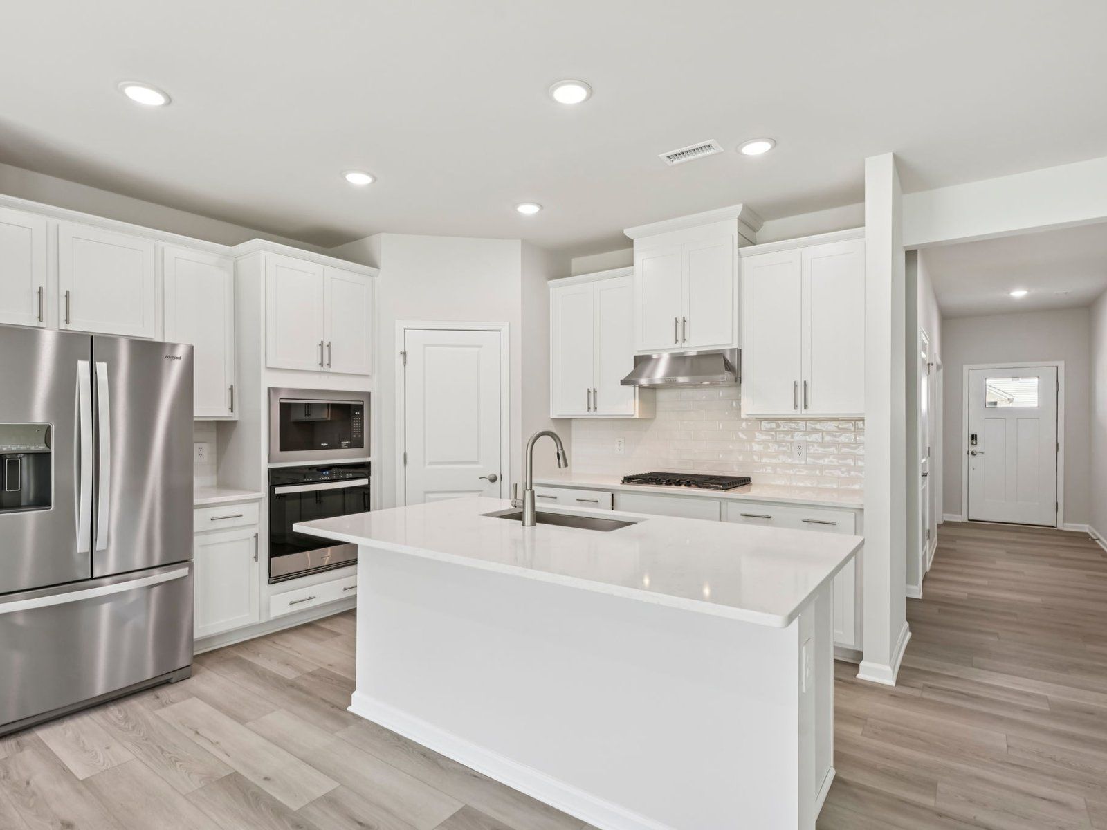Kitchen in the Chatham floorplan at a Meritage Homes community in Garner, NC.