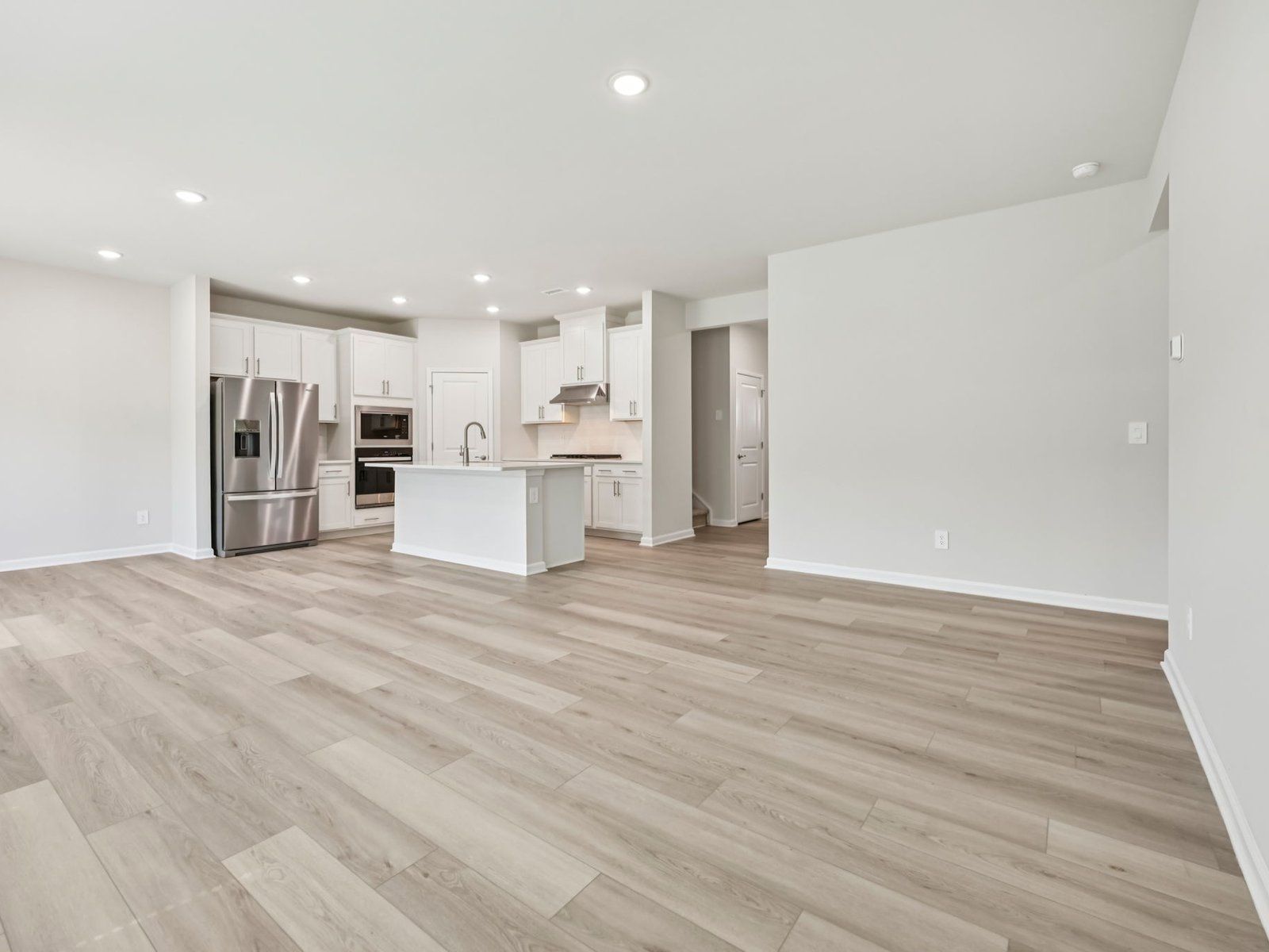 Great room in the Chatham floorplan at a Meritage Homes community in Garner, NC.